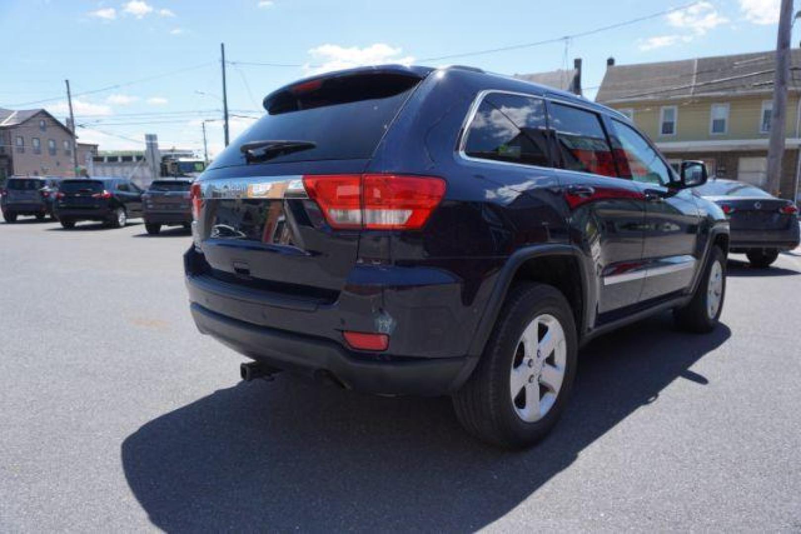 2013 True Blue Pearl Jeep Grand Cherokee Laredo 4WD (1C4RJFAG7DC) with an 3.6L V6 DOHC 24V engine, 5-Speed Automatic transmission, located at 312 Centre Ave, Schuylkill Haven, PA, 17972, (570) 593-5278, 40.638130, -76.177383 - automatic climate control, back up camera, heated front seats, leather seats, navigation, power sunroof, rear parking sensors, towing pkg - Photo#8