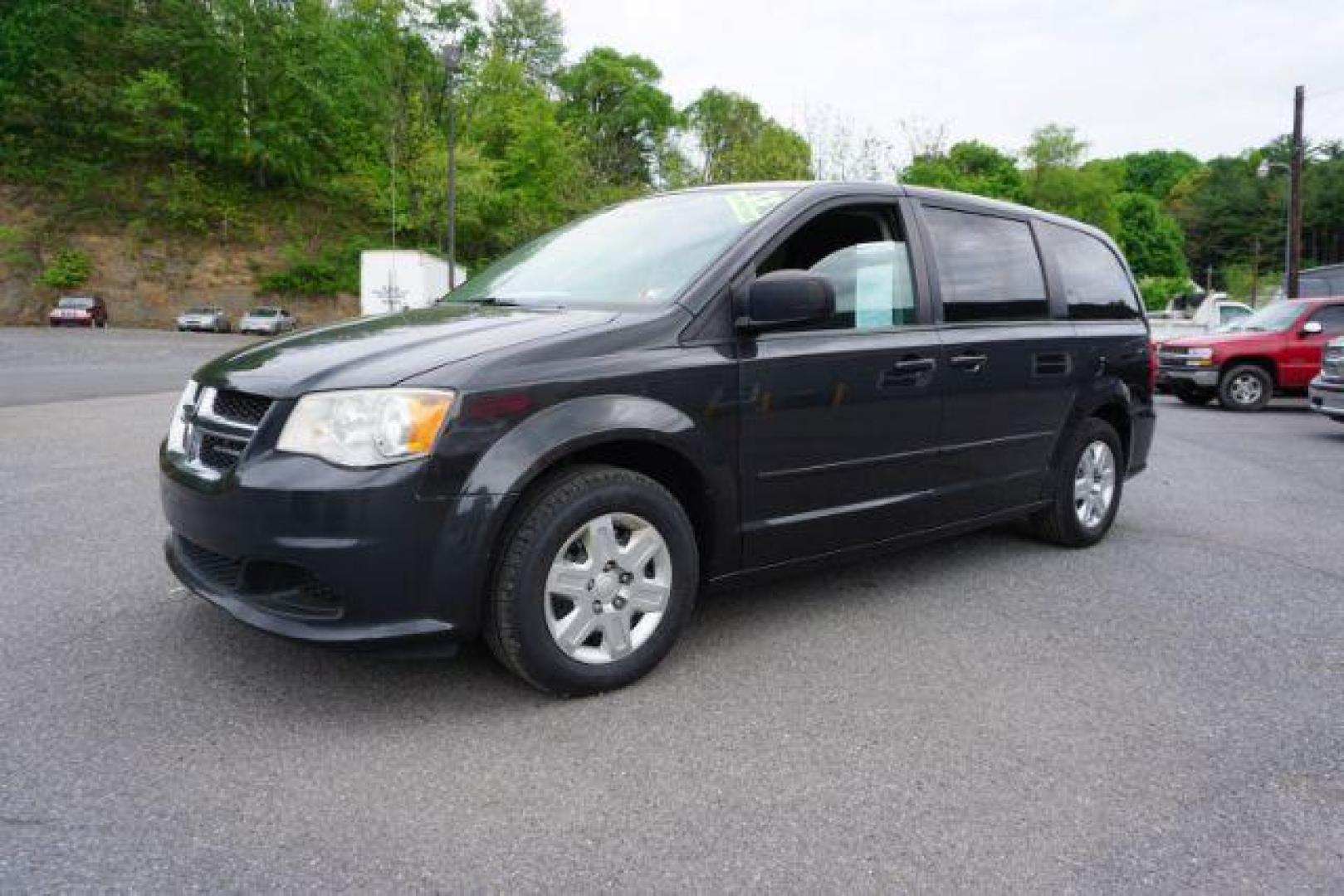 2012 Dark Charcoal Pearl Dodge Grand Caravan SE (2C4RDGBGXCR) with an 3.6L V6 DOHC 24V engine, 6-Speed Automatic transmission, located at 312 Centre Ave, Schuylkill Haven, PA, 17972, (570) 593-5278, 40.638130, -76.177383 - aluminum/alloy wheels, back up camera, bluetooth connection - Photo#0