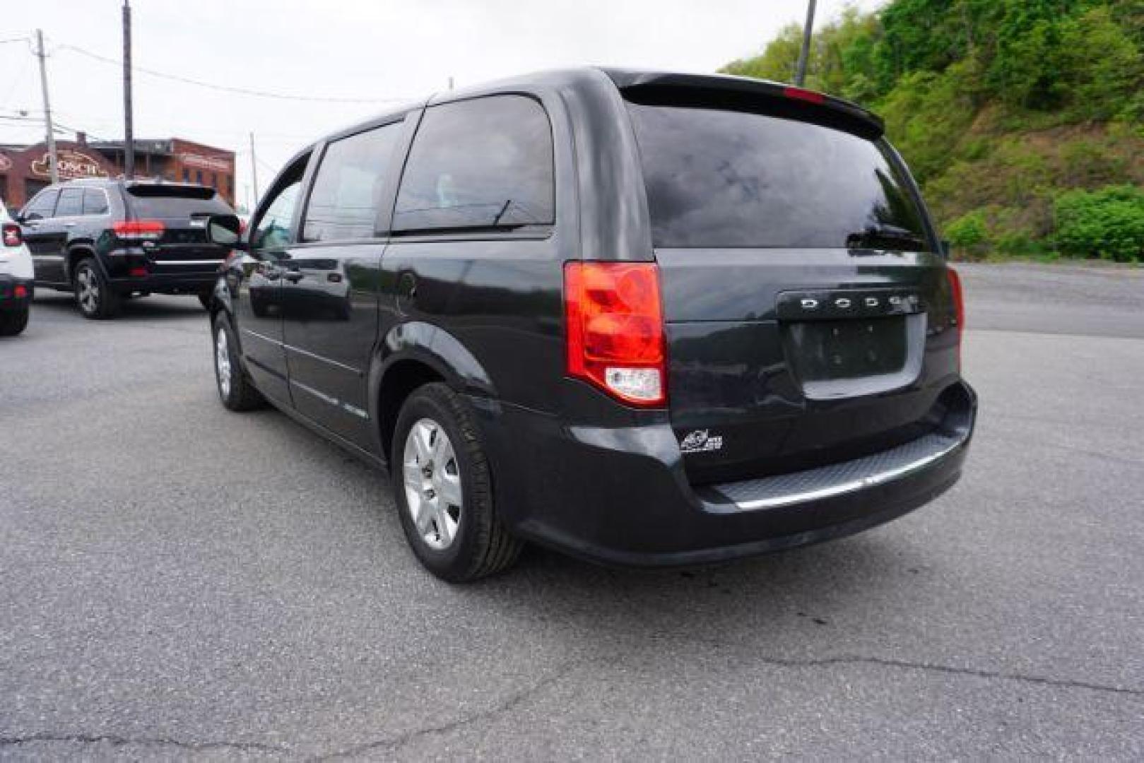 2012 Dark Charcoal Pearl Dodge Grand Caravan SE (2C4RDGBGXCR) with an 3.6L V6 DOHC 24V engine, 6-Speed Automatic transmission, located at 312 Centre Ave, Schuylkill Haven, PA, 17972, (570) 593-5278, 40.638130, -76.177383 - aluminum/alloy wheels, back up camera, bluetooth connection - Photo#11