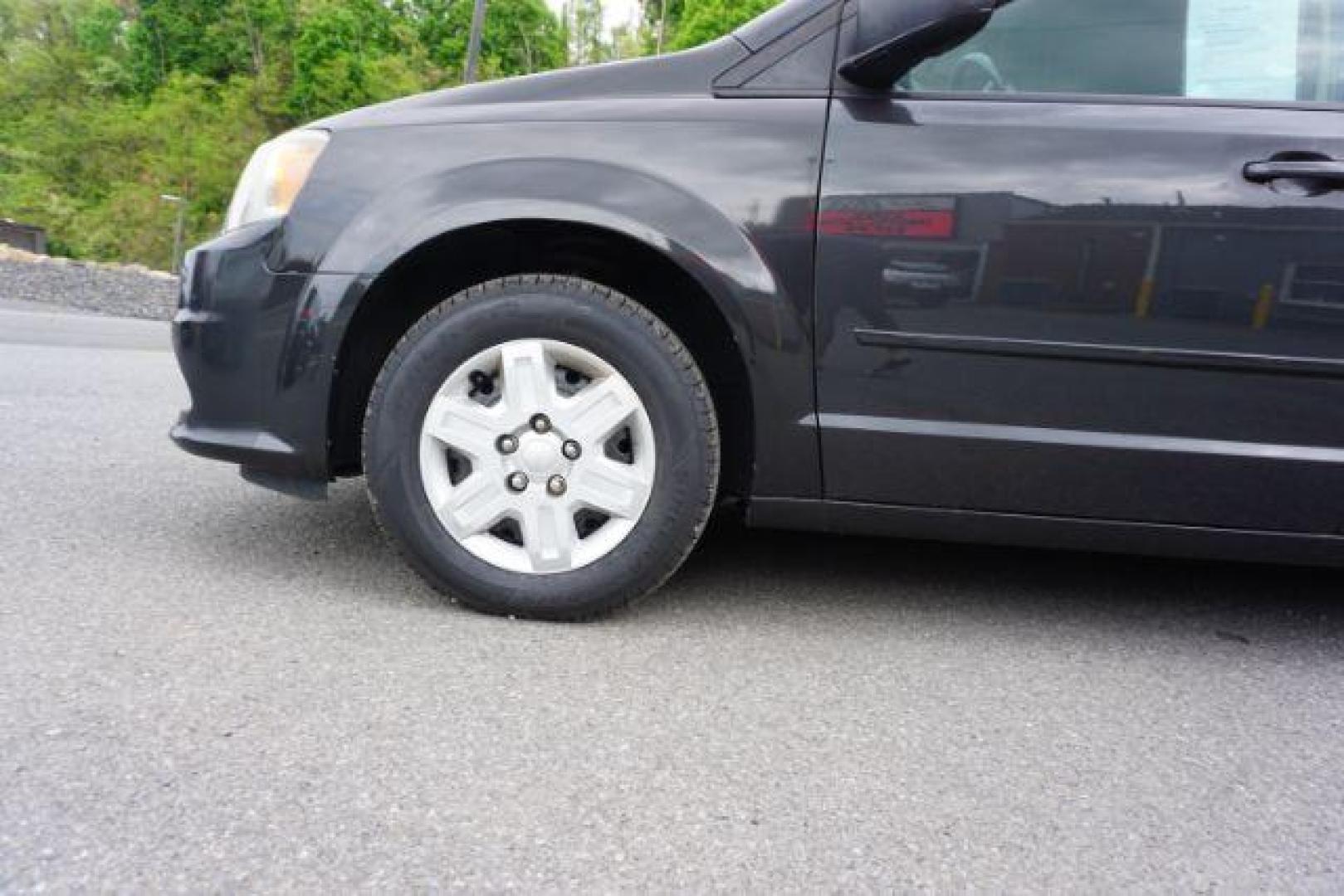 2012 Dark Charcoal Pearl Dodge Grand Caravan SE (2C4RDGBGXCR) with an 3.6L V6 DOHC 24V engine, 6-Speed Automatic transmission, located at 312 Centre Ave, Schuylkill Haven, PA, 17972, (570) 593-5278, 40.638130, -76.177383 - aluminum/alloy wheels, back up camera, bluetooth connection - Photo#13