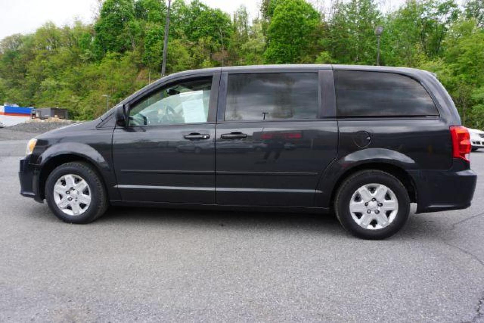 2012 Dark Charcoal Pearl Dodge Grand Caravan SE (2C4RDGBGXCR) with an 3.6L V6 DOHC 24V engine, 6-Speed Automatic transmission, located at 312 Centre Ave, Schuylkill Haven, PA, 17972, (570) 593-5278, 40.638130, -76.177383 - aluminum/alloy wheels, back up camera, bluetooth connection - Photo#14