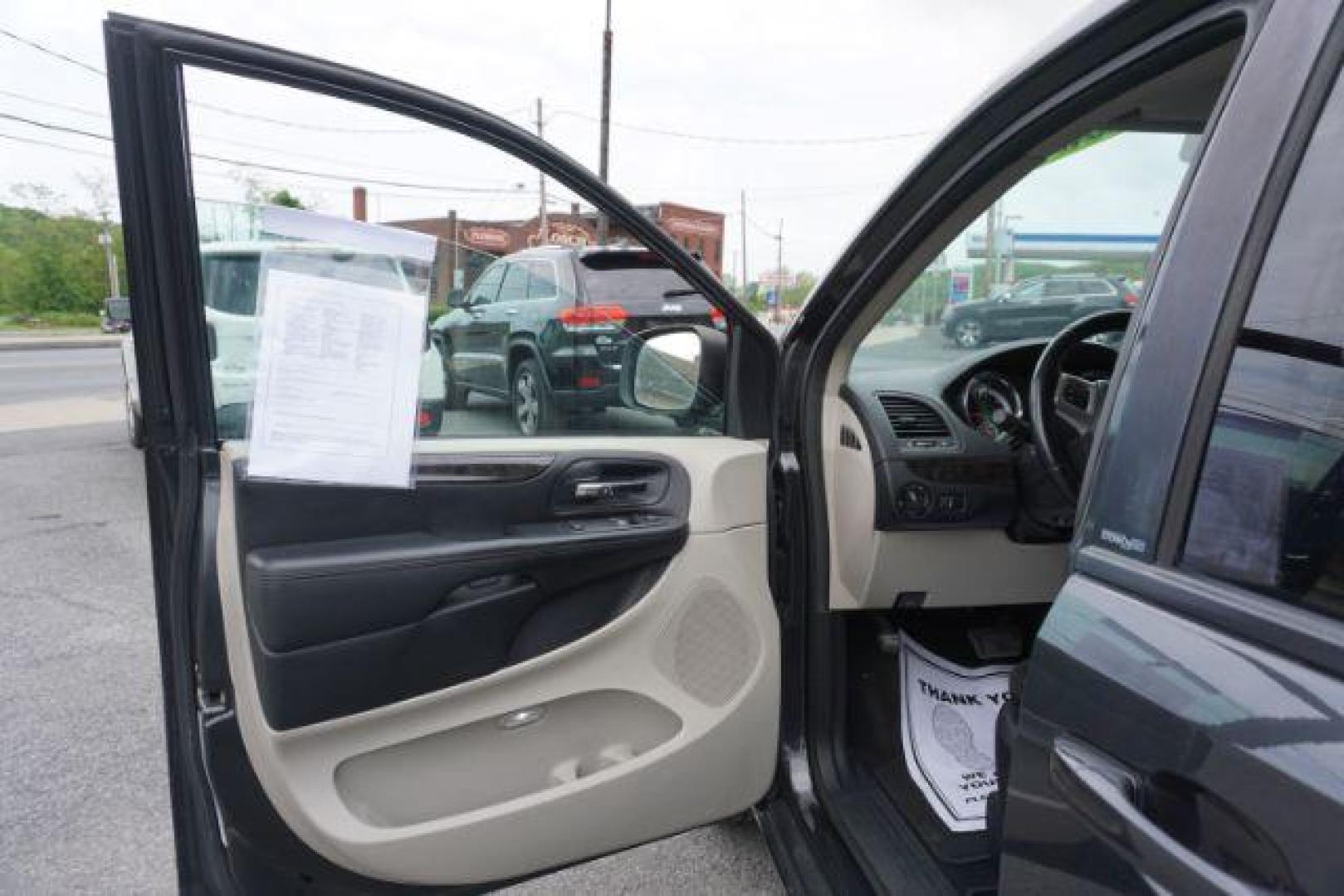 2012 Dark Charcoal Pearl Dodge Grand Caravan SE (2C4RDGBGXCR) with an 3.6L V6 DOHC 24V engine, 6-Speed Automatic transmission, located at 312 Centre Ave, Schuylkill Haven, PA, 17972, (570) 593-5278, 40.638130, -76.177383 - aluminum/alloy wheels, back up camera, bluetooth connection - Photo#15