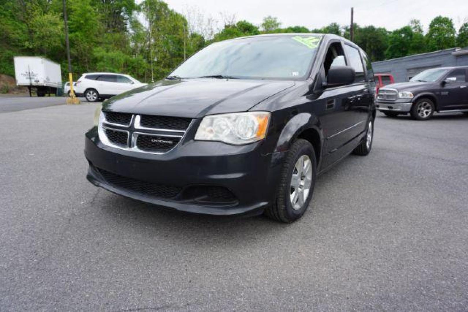 2012 Dark Charcoal Pearl Dodge Grand Caravan SE (2C4RDGBGXCR) with an 3.6L V6 DOHC 24V engine, 6-Speed Automatic transmission, located at 312 Centre Ave, Schuylkill Haven, PA, 17972, (570) 593-5278, 40.638130, -76.177383 - aluminum/alloy wheels, back up camera, bluetooth connection - Photo#1