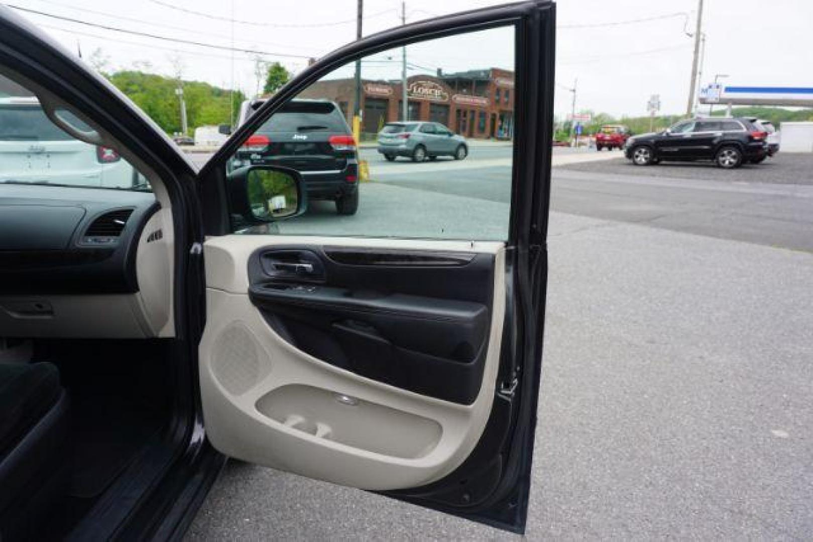 2012 Dark Charcoal Pearl Dodge Grand Caravan SE (2C4RDGBGXCR) with an 3.6L V6 DOHC 24V engine, 6-Speed Automatic transmission, located at 312 Centre Ave, Schuylkill Haven, PA, 17972, (570) 593-5278, 40.638130, -76.177383 - aluminum/alloy wheels, back up camera, bluetooth connection - Photo#45