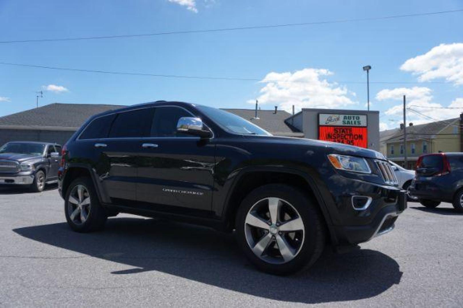 2014 Black Forest Green PC Jeep Grand Cherokee Limited 4WD (1C4RJFBG4EC) with an 3.6L V6 DOHC 24V engine, 5-Speed Automatic transmission, located at 312 Centre Ave, Schuylkill Haven, PA, 17972, (570) 593-5278, 40.638130, -76.177383 - HID headlamps. heated front seats, navigation, power liftgate, power sunroof, towing pkg, univ garage door opener - Photo#0