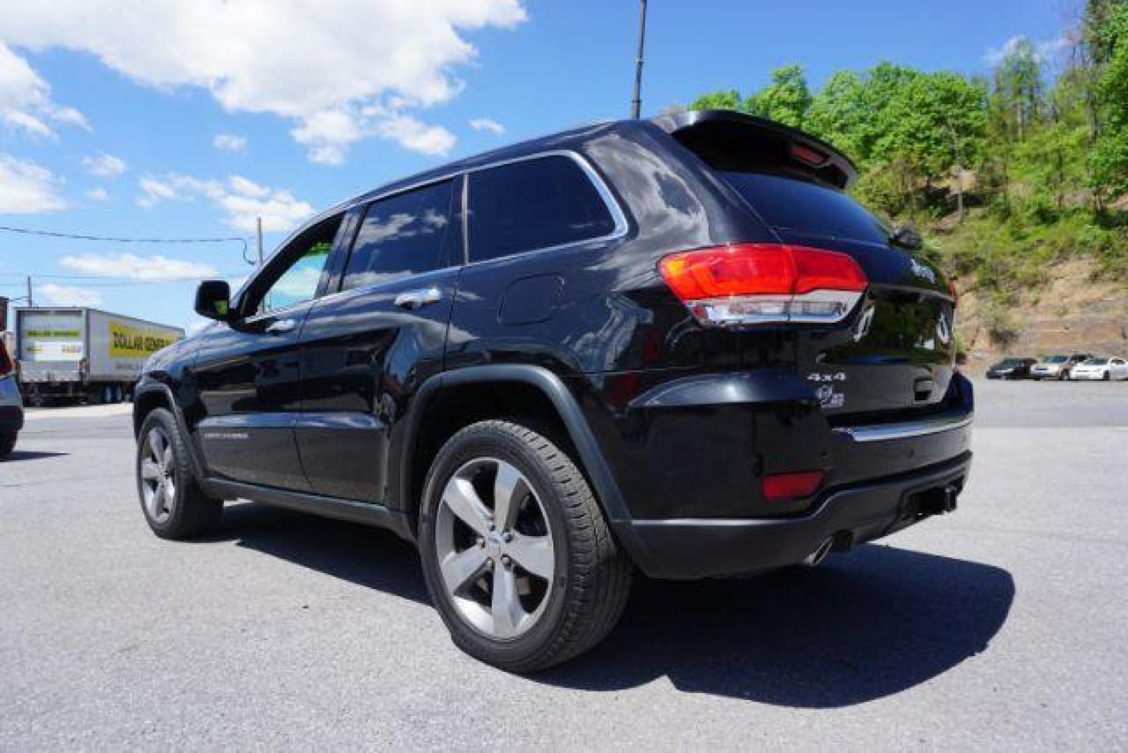 2014 Black Forest Green PC Jeep Grand Cherokee Limited 4WD (1C4RJFBG4EC) with an 3.6L V6 DOHC 24V engine, 5-Speed Automatic transmission, located at 312 Centre Ave, Schuylkill Haven, PA, 17972, (570) 593-5278, 40.638130, -76.177383 - HID headlamps. heated front seats, navigation, power liftgate, power sunroof, towing pkg, univ garage door opener - Photo#9