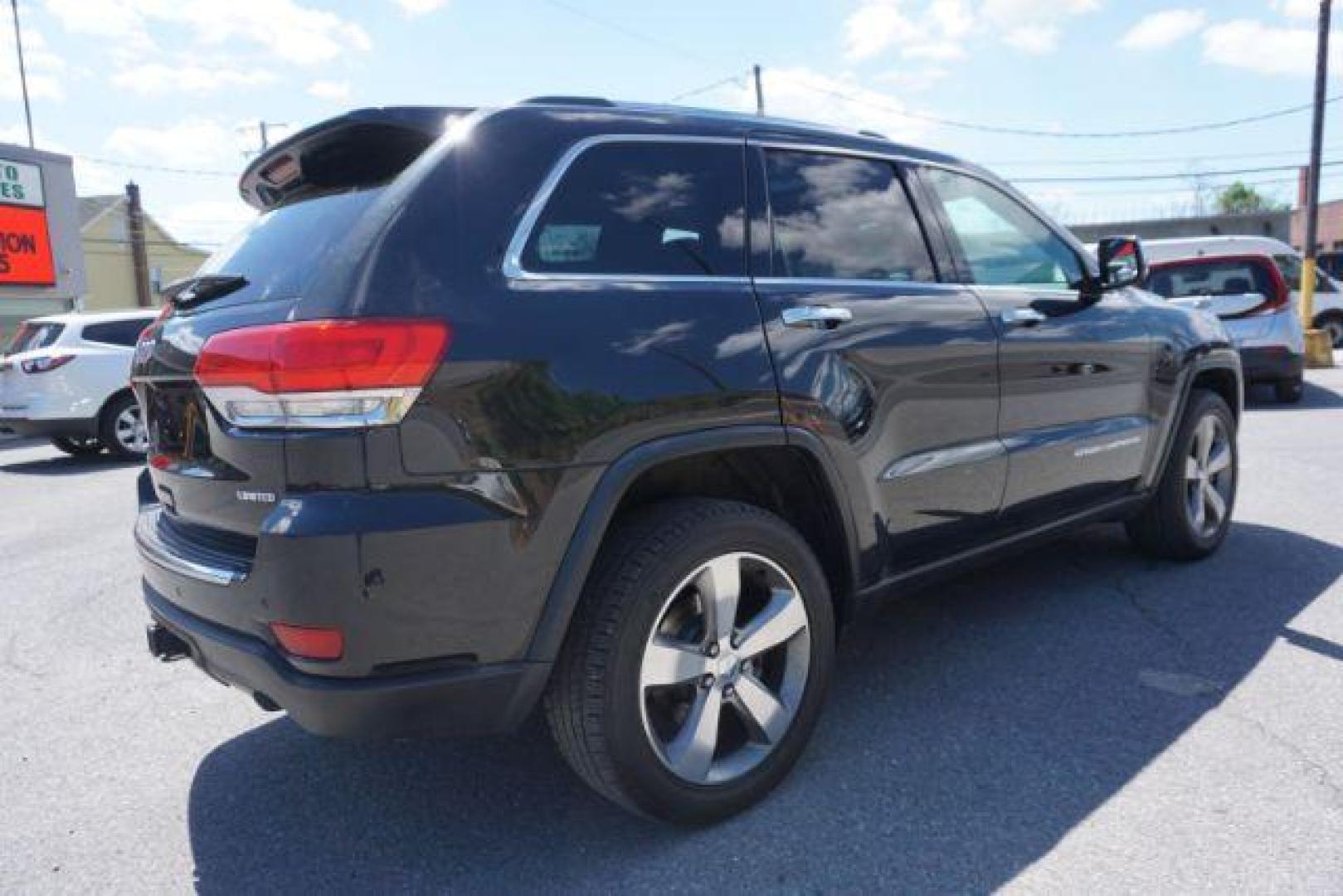 2014 Black Forest Green PC Jeep Grand Cherokee Limited 4WD (1C4RJFBG4EC) with an 3.6L V6 DOHC 24V engine, 5-Speed Automatic transmission, located at 312 Centre Ave, Schuylkill Haven, PA, 17972, (570) 593-5278, 40.638130, -76.177383 - HID headlamps. heated front seats, navigation, power liftgate, power sunroof, towing pkg, univ garage door opener - Photo#11