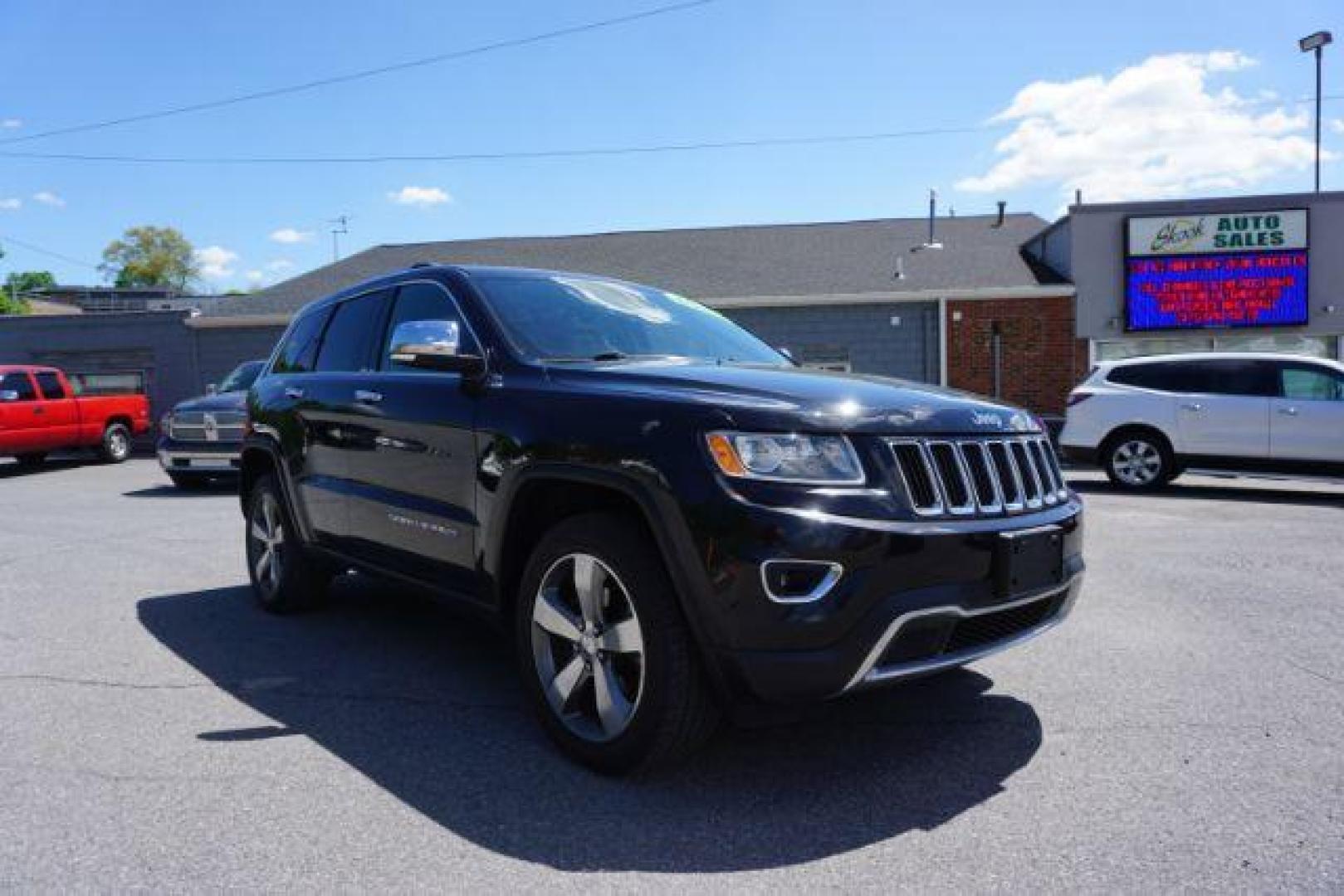 2014 Black Forest Green PC Jeep Grand Cherokee Limited 4WD (1C4RJFBG4EC) with an 3.6L V6 DOHC 24V engine, 5-Speed Automatic transmission, located at 312 Centre Ave, Schuylkill Haven, PA, 17972, (570) 593-5278, 40.638130, -76.177383 - HID headlamps. heated front seats, navigation, power liftgate, power sunroof, towing pkg, univ garage door opener - Photo#1