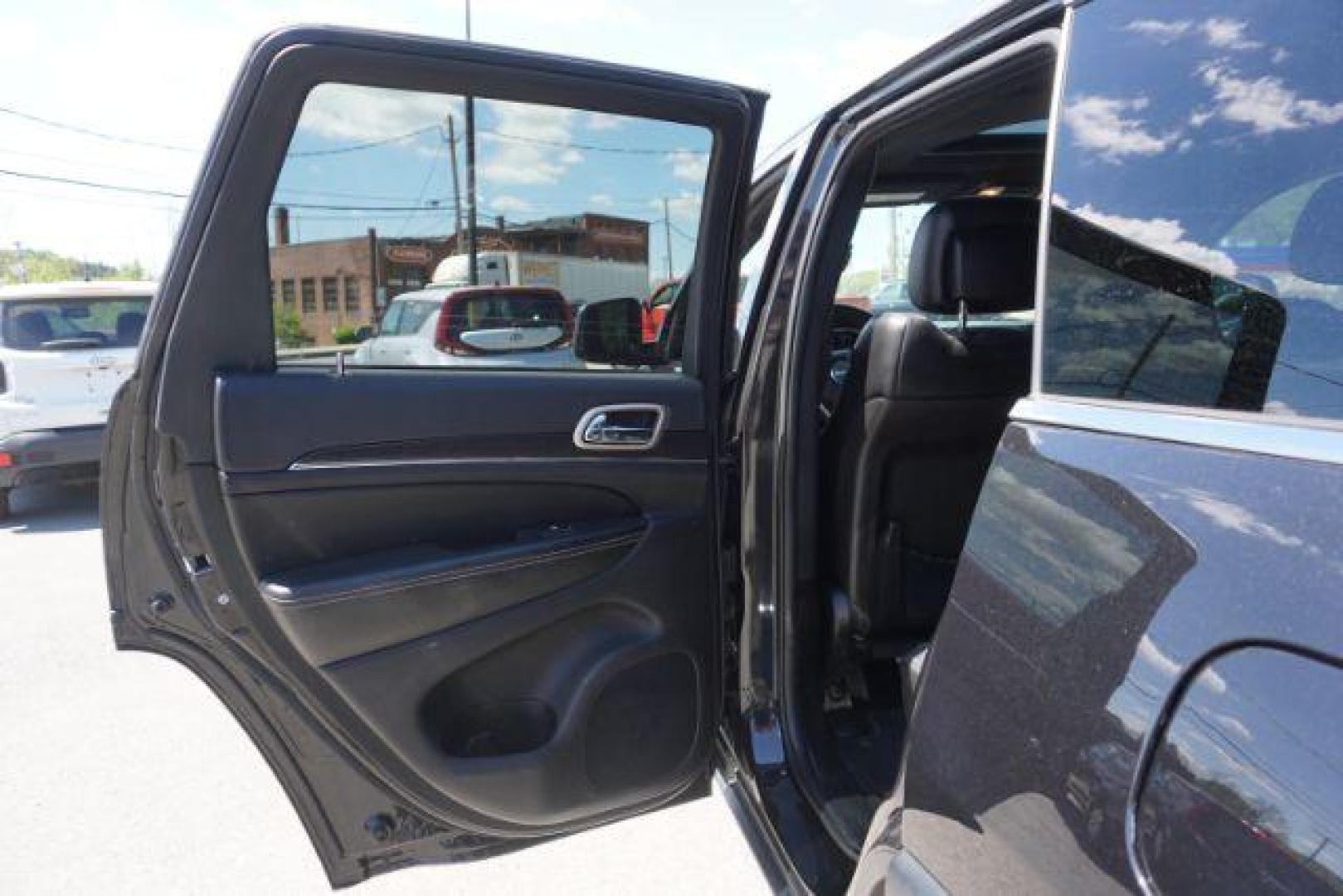 2014 Black Forest Green PC Jeep Grand Cherokee Limited 4WD (1C4RJFBG4EC) with an 3.6L V6 DOHC 24V engine, 5-Speed Automatic transmission, located at 312 Centre Ave, Schuylkill Haven, PA, 17972, (570) 593-5278, 40.638130, -76.177383 - HID headlamps. heated front seats, navigation, power liftgate, power sunroof, towing pkg, univ garage door opener - Photo#25