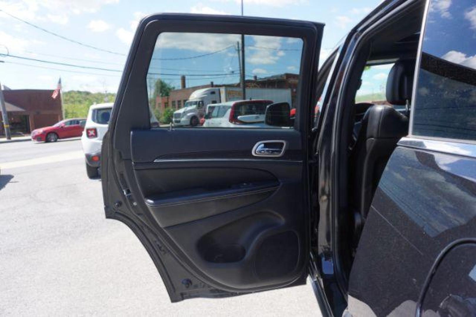 2014 Black Forest Green PC Jeep Grand Cherokee Limited 4WD (1C4RJFBG4EC) with an 3.6L V6 DOHC 24V engine, 5-Speed Automatic transmission, located at 312 Centre Ave, Schuylkill Haven, PA, 17972, (570) 593-5278, 40.638130, -76.177383 - HID headlamps. heated front seats, navigation, power liftgate, power sunroof, towing pkg, univ garage door opener - Photo#26