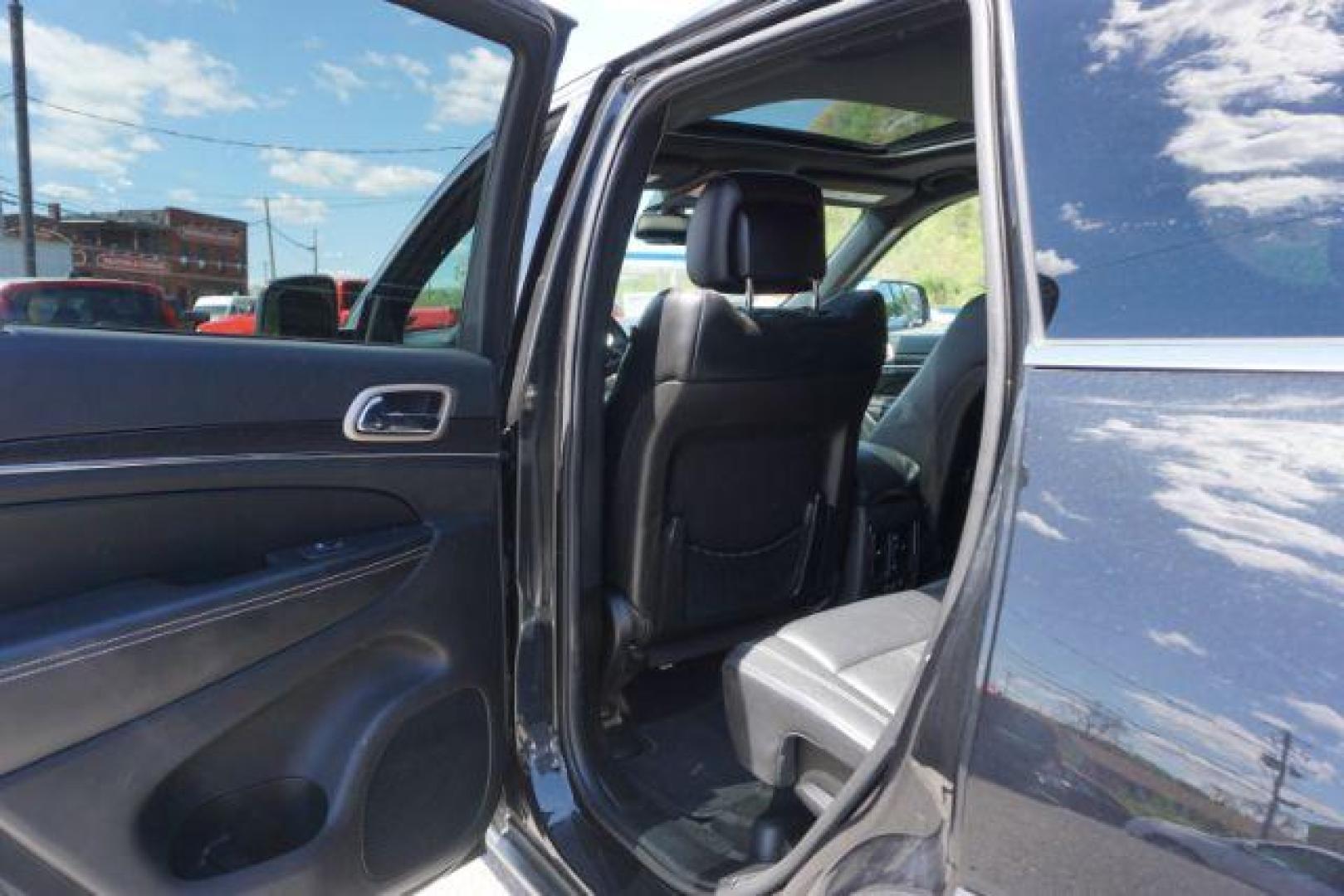 2014 Black Forest Green PC Jeep Grand Cherokee Limited 4WD (1C4RJFBG4EC) with an 3.6L V6 DOHC 24V engine, 5-Speed Automatic transmission, located at 312 Centre Ave, Schuylkill Haven, PA, 17972, (570) 593-5278, 40.638130, -76.177383 - HID headlamps. heated front seats, navigation, power liftgate, power sunroof, towing pkg, univ garage door opener - Photo#27