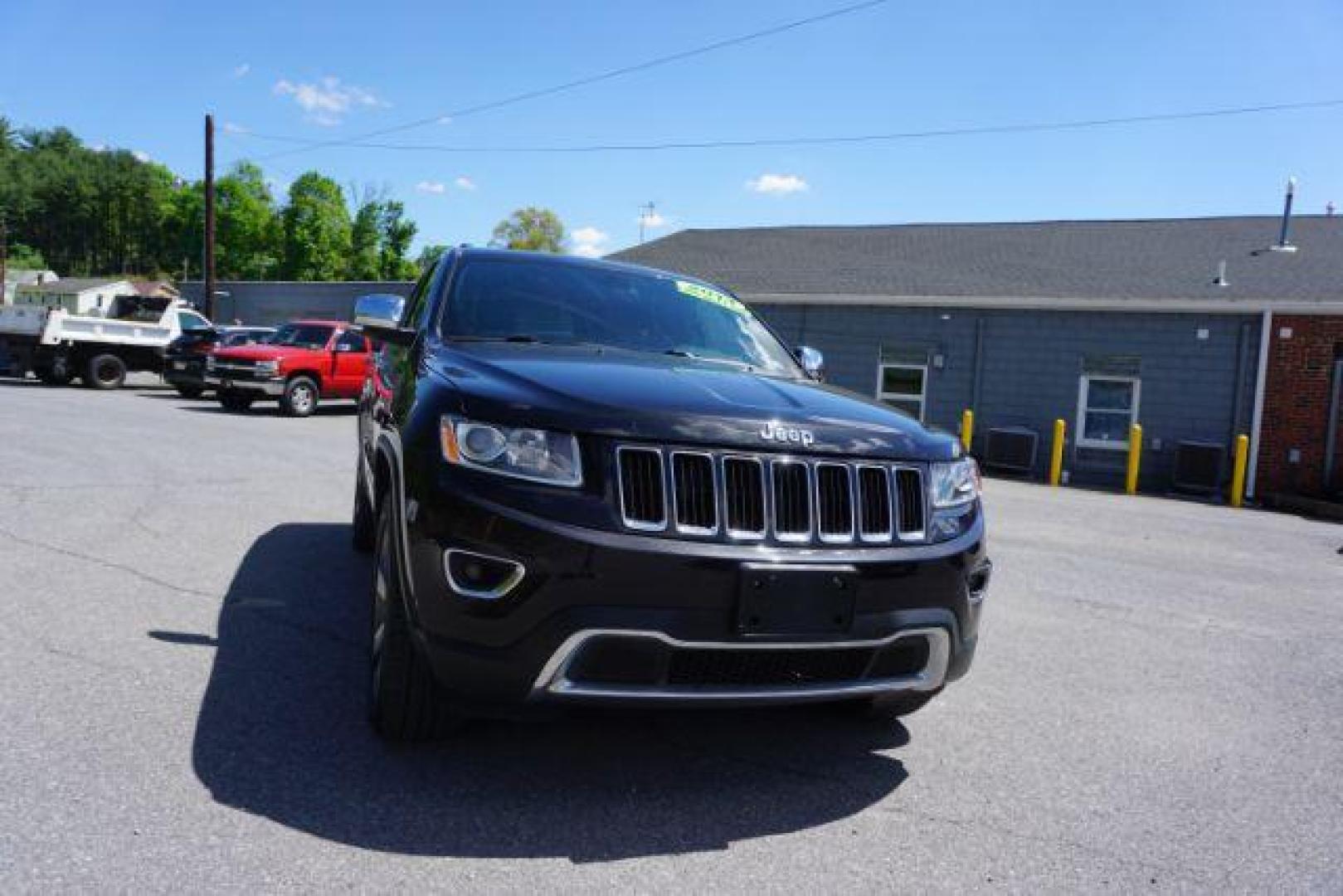 2014 Black Forest Green PC Jeep Grand Cherokee Limited 4WD (1C4RJFBG4EC) with an 3.6L V6 DOHC 24V engine, 5-Speed Automatic transmission, located at 312 Centre Ave, Schuylkill Haven, PA, 17972, (570) 593-5278, 40.638130, -76.177383 - HID headlamps. heated front seats, navigation, power liftgate, power sunroof, towing pkg, univ garage door opener - Photo#2