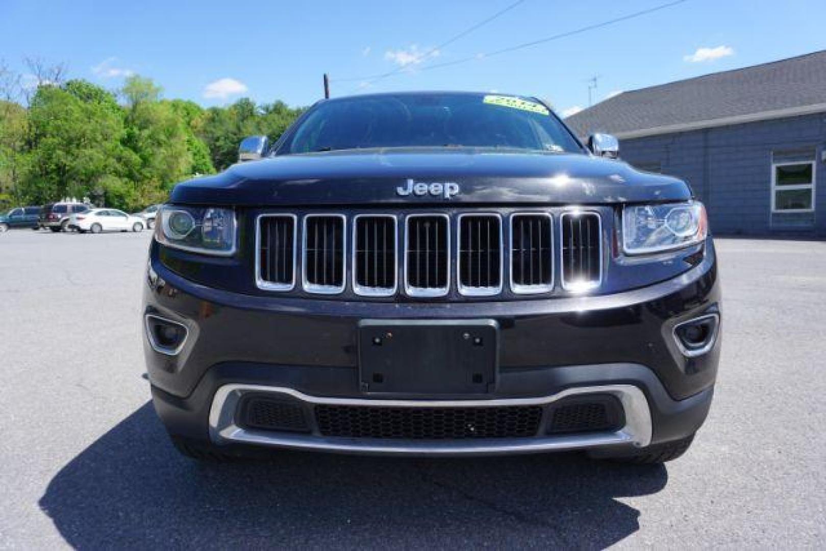 2014 Black Forest Green PC Jeep Grand Cherokee Limited 4WD (1C4RJFBG4EC) with an 3.6L V6 DOHC 24V engine, 5-Speed Automatic transmission, located at 312 Centre Ave, Schuylkill Haven, PA, 17972, (570) 593-5278, 40.638130, -76.177383 - HID headlamps. heated front seats, navigation, power liftgate, power sunroof, towing pkg, univ garage door opener - Photo#3