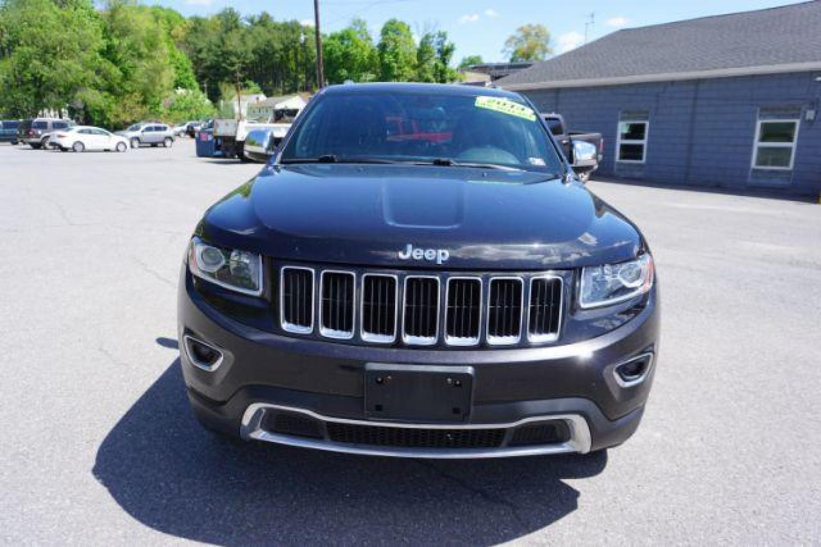 2014 Black Forest Green PC Jeep Grand Cherokee Limited 4WD (1C4RJFBG4EC) with an 3.6L V6 DOHC 24V engine, 5-Speed Automatic transmission, located at 312 Centre Ave, Schuylkill Haven, PA, 17972, (570) 593-5278, 40.638130, -76.177383 - HID headlamps. heated front seats, navigation, power liftgate, power sunroof, towing pkg, univ garage door opener - Photo#4