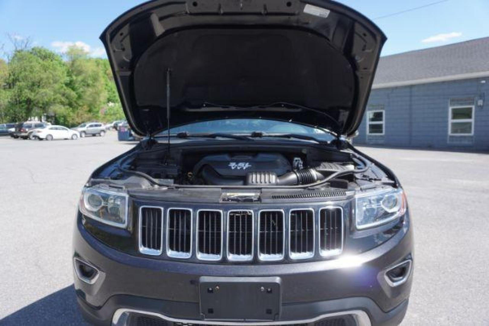 2014 Black Forest Green PC Jeep Grand Cherokee Limited 4WD (1C4RJFBG4EC) with an 3.6L V6 DOHC 24V engine, 5-Speed Automatic transmission, located at 312 Centre Ave, Schuylkill Haven, PA, 17972, (570) 593-5278, 40.638130, -76.177383 - HID headlamps. heated front seats, navigation, power liftgate, power sunroof, towing pkg, univ garage door opener - Photo#51