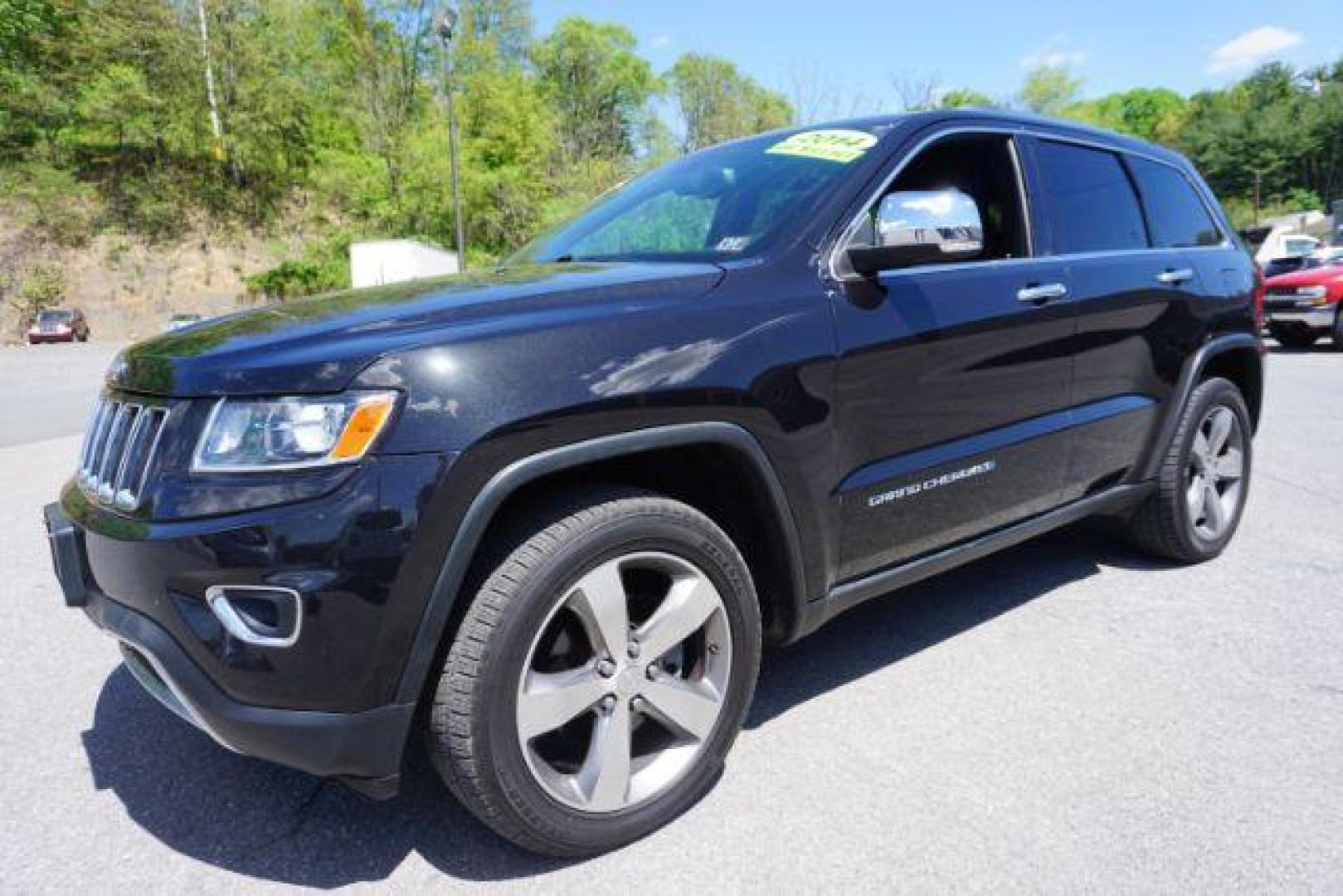 2014 Black Forest Green PC Jeep Grand Cherokee Limited 4WD (1C4RJFBG4EC) with an 3.6L V6 DOHC 24V engine, 5-Speed Automatic transmission, located at 312 Centre Ave, Schuylkill Haven, PA, 17972, (570) 593-5278, 40.638130, -76.177383 - HID headlamps. heated front seats, navigation, power liftgate, power sunroof, towing pkg, univ garage door opener - Photo#5