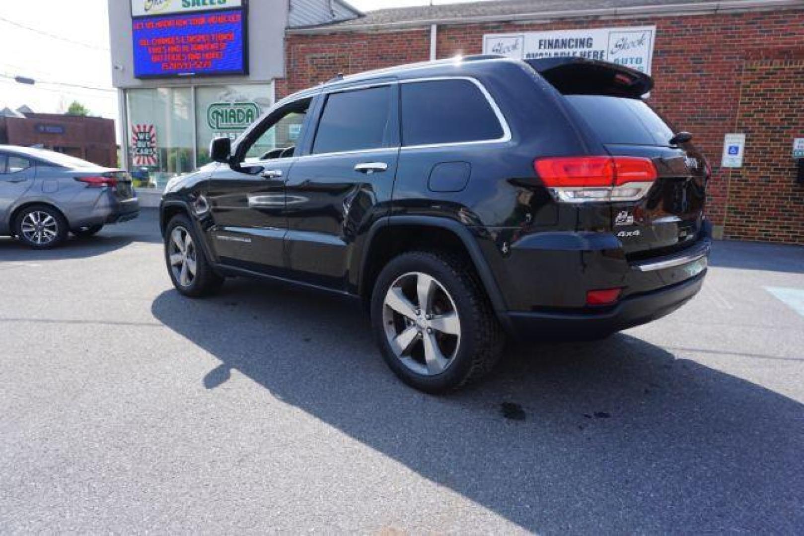 2015 Black Forest Green PC /Black Jeep Grand Cherokee Limited 4WD (1C4RJFBG4FC) with an 3.6L V6 DOHC 24V engine, 8-Speed Automatic transmission, located at 312 Centre Ave, Schuylkill Haven, PA, 17972, (570) 593-5278, 40.638130, -76.177383 - back up camera, HID headlamps, heated front seats, lane departure warning, leather seats, navigation, power liftgate - Photo#13