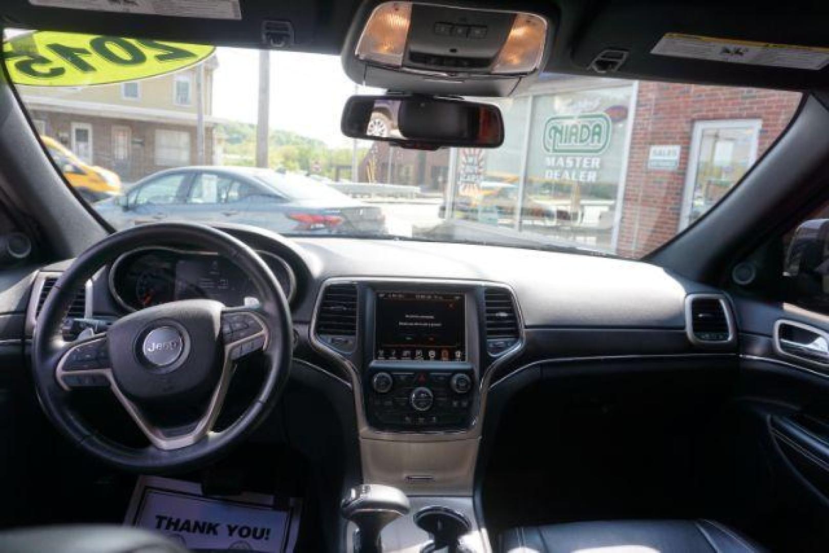 2015 Black Forest Green PC /Black Jeep Grand Cherokee Limited 4WD (1C4RJFBG4FC) with an 3.6L V6 DOHC 24V engine, 8-Speed Automatic transmission, located at 312 Centre Ave, Schuylkill Haven, PA, 17972, (570) 593-5278, 40.638130, -76.177383 - back up camera, HID headlamps, heated front seats, lane departure warning, leather seats, navigation, power liftgate - Photo#37