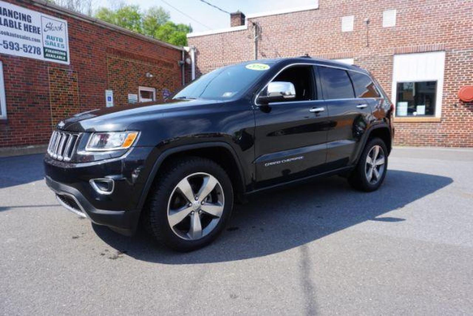 2015 Black Forest Green PC /Black Jeep Grand Cherokee Limited 4WD (1C4RJFBG4FC) with an 3.6L V6 DOHC 24V engine, 8-Speed Automatic transmission, located at 312 Centre Ave, Schuylkill Haven, PA, 17972, (570) 593-5278, 40.638130, -76.177383 - back up camera, HID headlamps, heated front seats, lane departure warning, leather seats, navigation, power liftgate - Photo#3