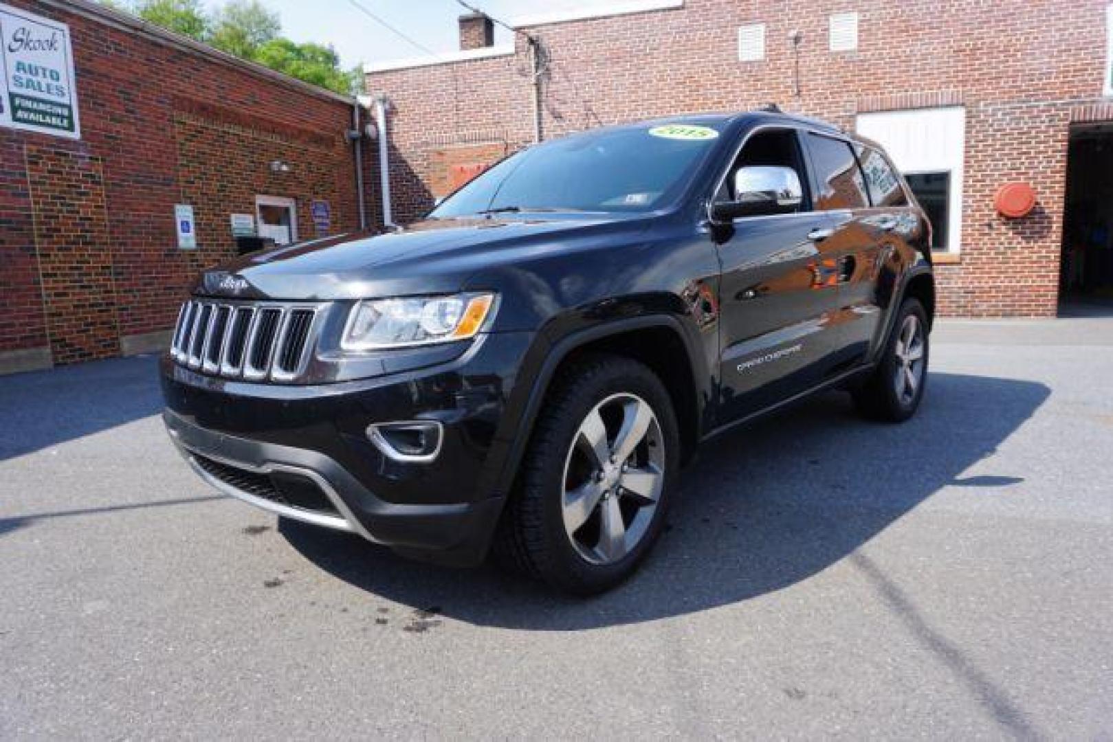 2015 Black Forest Green PC /Black Jeep Grand Cherokee Limited 4WD (1C4RJFBG4FC) with an 3.6L V6 DOHC 24V engine, 8-Speed Automatic transmission, located at 312 Centre Ave, Schuylkill Haven, PA, 17972, (570) 593-5278, 40.638130, -76.177383 - back up camera, HID headlamps, heated front seats, lane departure warning, leather seats, navigation, power liftgate - Photo#4