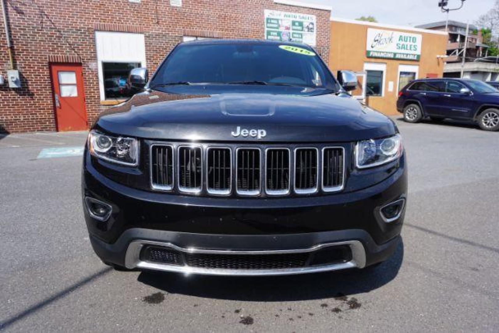 2015 Black Forest Green PC /Black Jeep Grand Cherokee Limited 4WD (1C4RJFBG4FC) with an 3.6L V6 DOHC 24V engine, 8-Speed Automatic transmission, located at 312 Centre Ave, Schuylkill Haven, PA, 17972, (570) 593-5278, 40.638130, -76.177383 - back up camera, HID headlamps, heated front seats, lane departure warning, leather seats, navigation, power liftgate - Photo#5