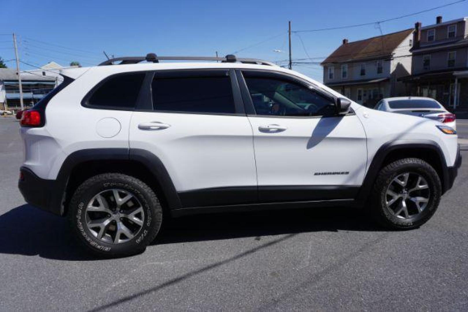 2015 Bright White Clearcoat Jeep Cherokee Trailhawk 4WD (1C4PJMBS2FW) with an 3.2L V6 DOHC 24V engine, 9-Speed Automatic transmission, located at 312 Centre Ave, Schuylkill Haven, PA, 17972, (570) 593-5278, 40.638130, -76.177383 - driver's seat memory, heated front seats, lane departure warning, leather seats, navigation, passive keyless entry, power drivers seat, power liftgate, power sunroof, rear parking sensors, towing pkg - Photo#10