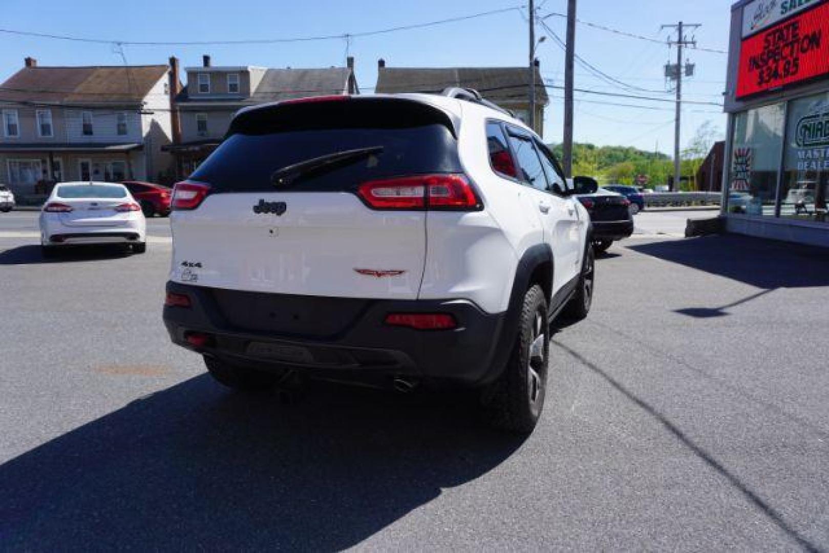 2015 Bright White Clearcoat Jeep Cherokee Trailhawk 4WD (1C4PJMBS2FW) with an 3.2L V6 DOHC 24V engine, 9-Speed Automatic transmission, located at 312 Centre Ave, Schuylkill Haven, PA, 17972, (570) 593-5278, 40.638130, -76.177383 - driver's seat memory, heated front seats, lane departure warning, leather seats, navigation, passive keyless entry, power drivers seat, power liftgate, power sunroof, rear parking sensors, towing pkg - Photo#11