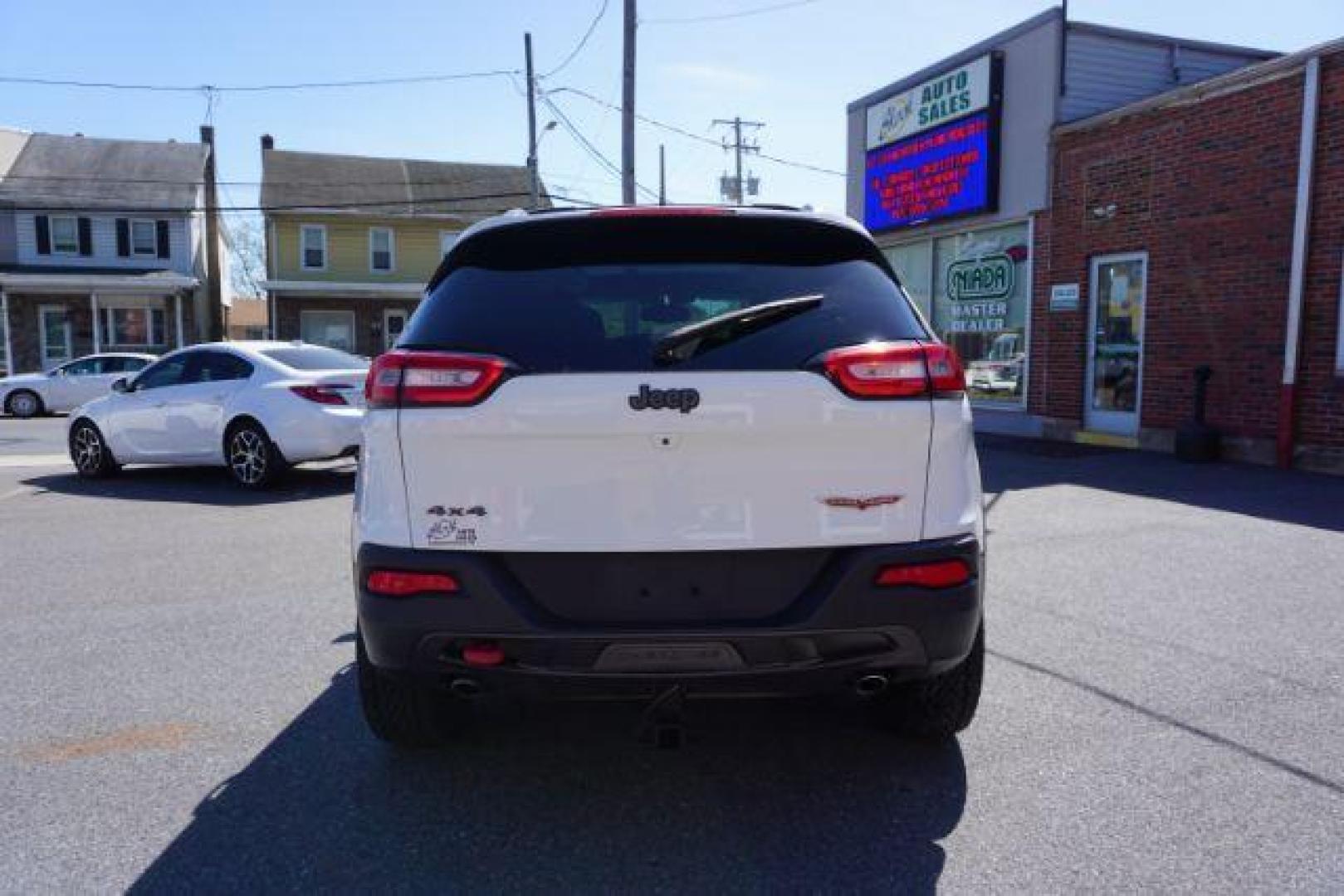 2015 Bright White Clearcoat Jeep Cherokee Trailhawk 4WD (1C4PJMBS2FW) with an 3.2L V6 DOHC 24V engine, 9-Speed Automatic transmission, located at 312 Centre Ave, Schuylkill Haven, PA, 17972, (570) 593-5278, 40.638130, -76.177383 - driver's seat memory, heated front seats, lane departure warning, leather seats, navigation, passive keyless entry, power drivers seat, power liftgate, power sunroof, rear parking sensors, towing pkg - Photo#12