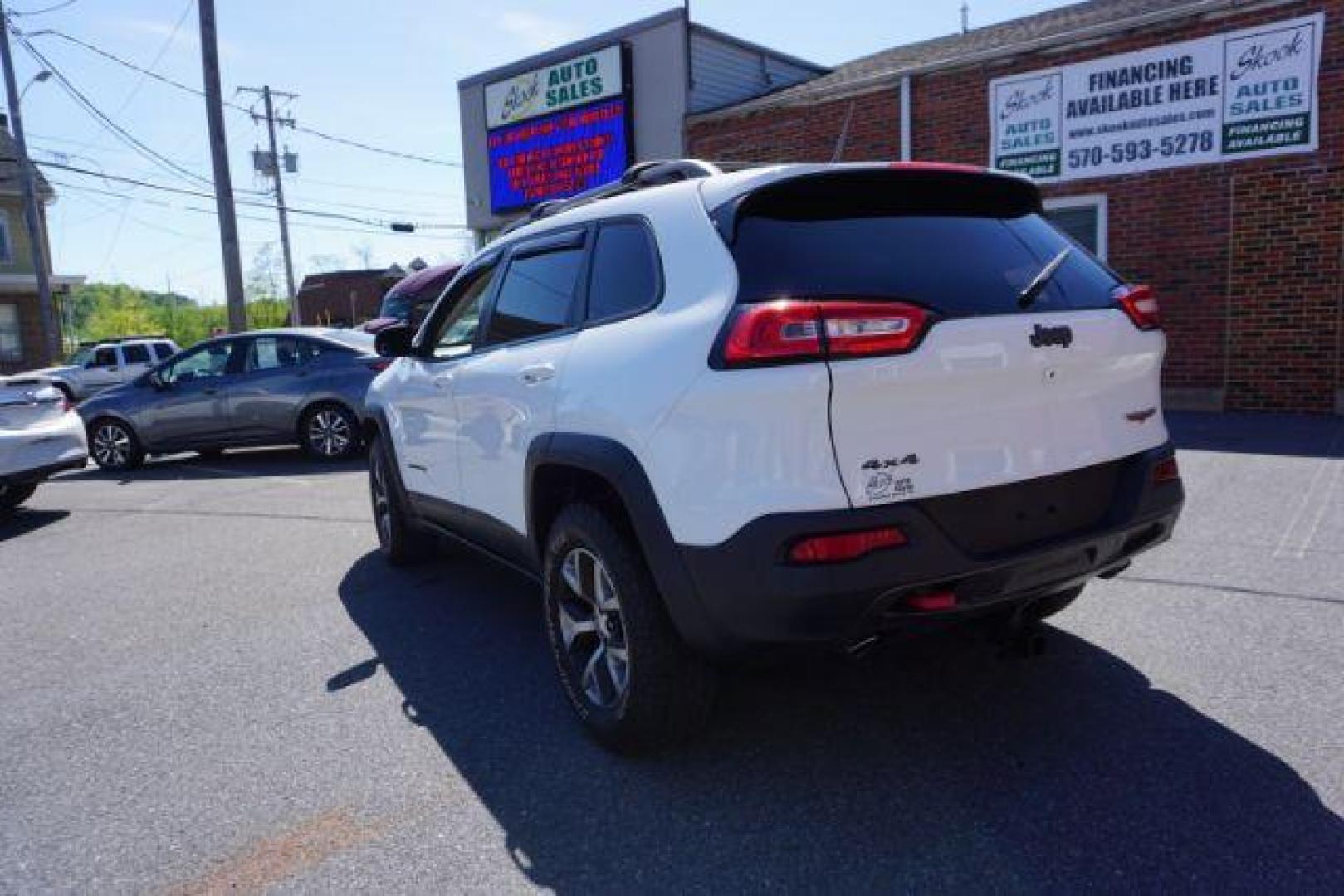 2015 Bright White Clearcoat Jeep Cherokee Trailhawk 4WD (1C4PJMBS2FW) with an 3.2L V6 DOHC 24V engine, 9-Speed Automatic transmission, located at 312 Centre Ave, Schuylkill Haven, PA, 17972, (570) 593-5278, 40.638130, -76.177383 - driver's seat memory, heated front seats, lane departure warning, leather seats, navigation, passive keyless entry, power drivers seat, power liftgate, power sunroof, rear parking sensors, towing pkg - Photo#13