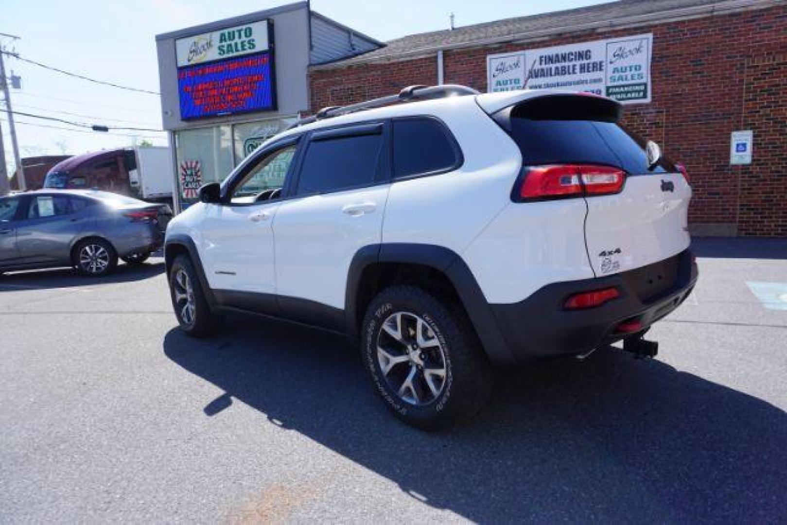 2015 Bright White Clearcoat Jeep Cherokee Trailhawk 4WD (1C4PJMBS2FW) with an 3.2L V6 DOHC 24V engine, 9-Speed Automatic transmission, located at 312 Centre Ave, Schuylkill Haven, PA, 17972, (570) 593-5278, 40.638130, -76.177383 - driver's seat memory, heated front seats, lane departure warning, leather seats, navigation, passive keyless entry, power drivers seat, power liftgate, power sunroof, rear parking sensors, towing pkg - Photo#14