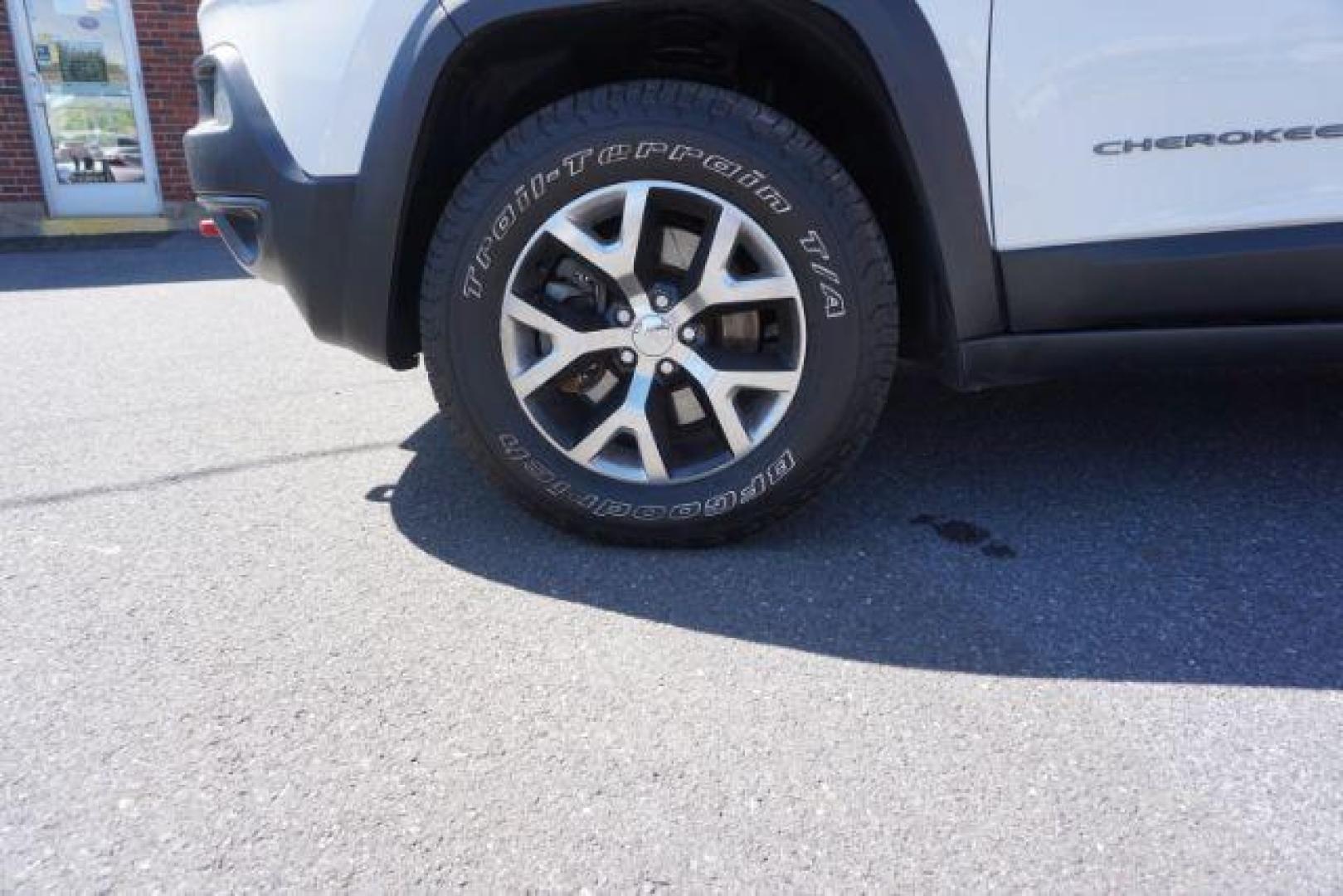 2015 Bright White Clearcoat Jeep Cherokee Trailhawk 4WD (1C4PJMBS2FW) with an 3.2L V6 DOHC 24V engine, 9-Speed Automatic transmission, located at 312 Centre Ave, Schuylkill Haven, PA, 17972, (570) 593-5278, 40.638130, -76.177383 - driver's seat memory, heated front seats, lane departure warning, leather seats, navigation, passive keyless entry, power drivers seat, power liftgate, power sunroof, rear parking sensors, towing pkg - Photo#16