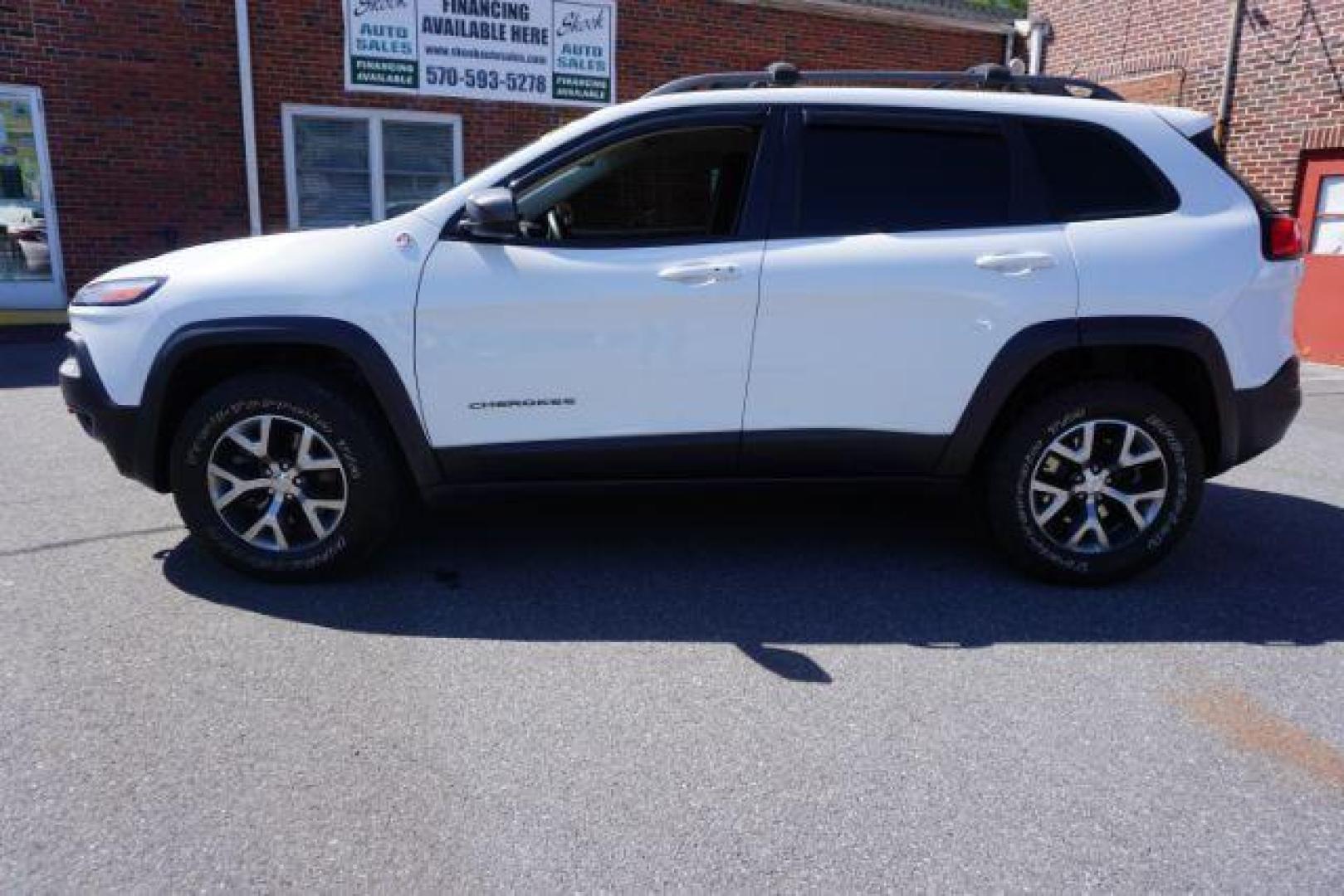 2015 Bright White Clearcoat Jeep Cherokee Trailhawk 4WD (1C4PJMBS2FW) with an 3.2L V6 DOHC 24V engine, 9-Speed Automatic transmission, located at 312 Centre Ave, Schuylkill Haven, PA, 17972, (570) 593-5278, 40.638130, -76.177383 - driver's seat memory, heated front seats, lane departure warning, leather seats, navigation, passive keyless entry, power drivers seat, power liftgate, power sunroof, rear parking sensors, towing pkg - Photo#17