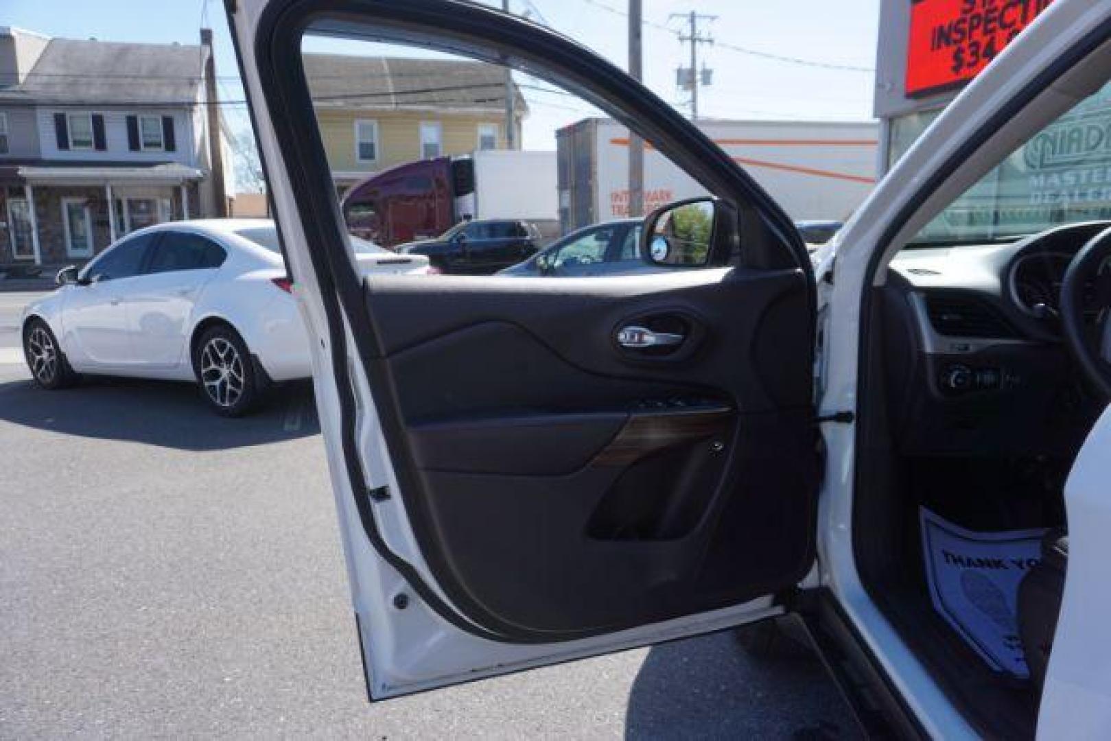 2015 Bright White Clearcoat Jeep Cherokee Trailhawk 4WD (1C4PJMBS2FW) with an 3.2L V6 DOHC 24V engine, 9-Speed Automatic transmission, located at 312 Centre Ave, Schuylkill Haven, PA, 17972, (570) 593-5278, 40.638130, -76.177383 - driver's seat memory, heated front seats, lane departure warning, leather seats, navigation, passive keyless entry, power drivers seat, power liftgate, power sunroof, rear parking sensors, towing pkg - Photo#19