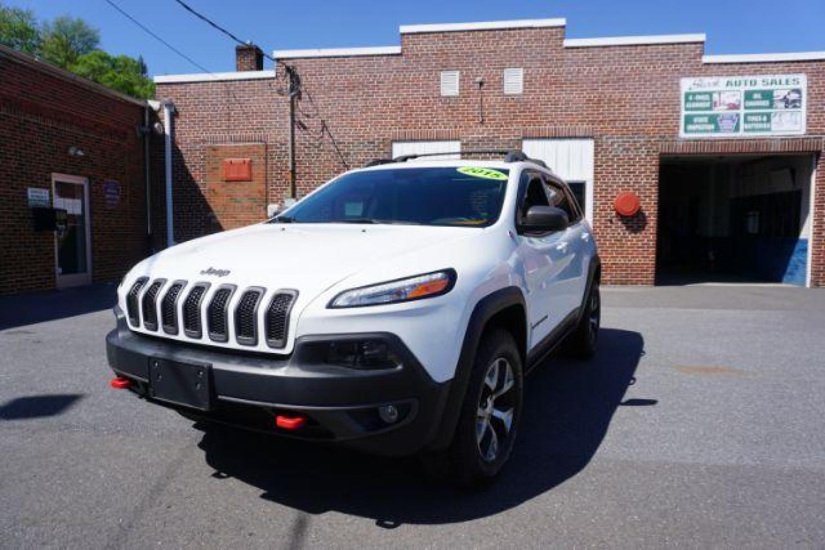 2015 Bright White Clearcoat Jeep Cherokee Trailhawk 4WD (1C4PJMBS2FW) with an 3.2L V6 DOHC 24V engine, 9-Speed Automatic transmission, located at 312 Centre Ave, Schuylkill Haven, PA, 17972, (570) 593-5278, 40.638130, -76.177383 - driver's seat memory, heated front seats, lane departure warning, leather seats, navigation, passive keyless entry, power drivers seat, power liftgate, power sunroof, rear parking sensors, towing pkg - Photo#3