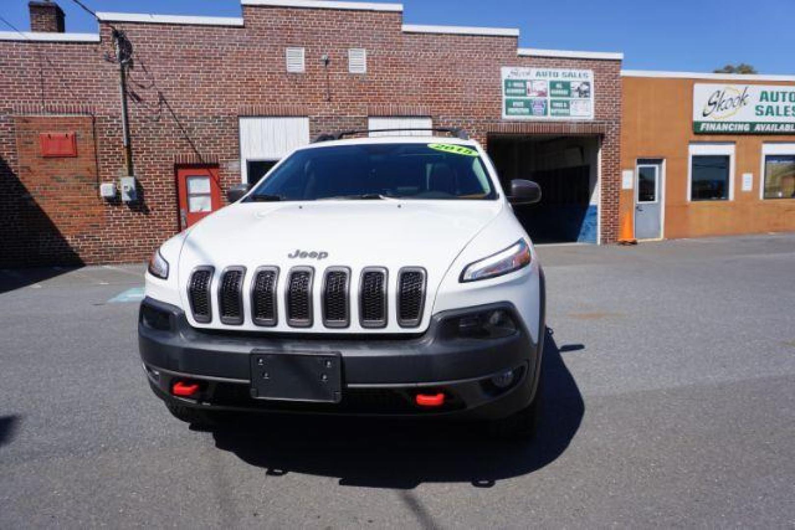 2015 Bright White Clearcoat Jeep Cherokee Trailhawk 4WD (1C4PJMBS2FW) with an 3.2L V6 DOHC 24V engine, 9-Speed Automatic transmission, located at 312 Centre Ave, Schuylkill Haven, PA, 17972, (570) 593-5278, 40.638130, -76.177383 - driver's seat memory, heated front seats, lane departure warning, leather seats, navigation, passive keyless entry, power drivers seat, power liftgate, power sunroof, rear parking sensors, towing pkg - Photo#4