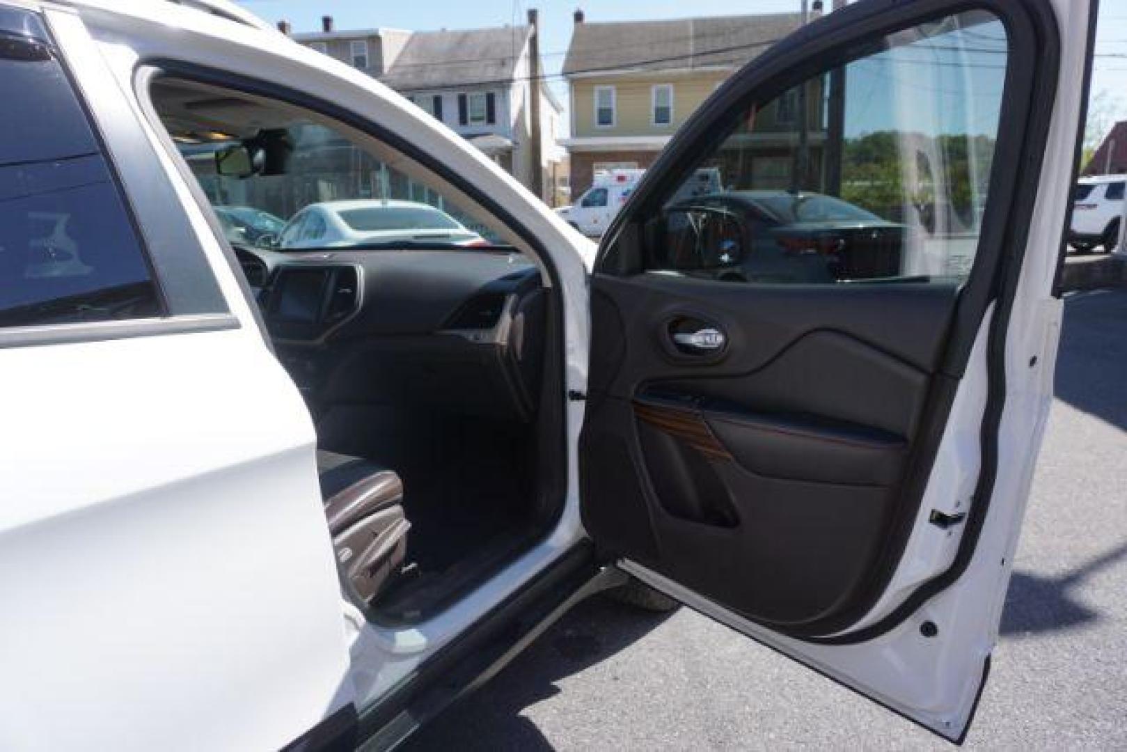 2015 Bright White Clearcoat Jeep Cherokee Trailhawk 4WD (1C4PJMBS2FW) with an 3.2L V6 DOHC 24V engine, 9-Speed Automatic transmission, located at 312 Centre Ave, Schuylkill Haven, PA, 17972, (570) 593-5278, 40.638130, -76.177383 - driver's seat memory, heated front seats, lane departure warning, leather seats, navigation, passive keyless entry, power drivers seat, power liftgate, power sunroof, rear parking sensors, towing pkg - Photo#49