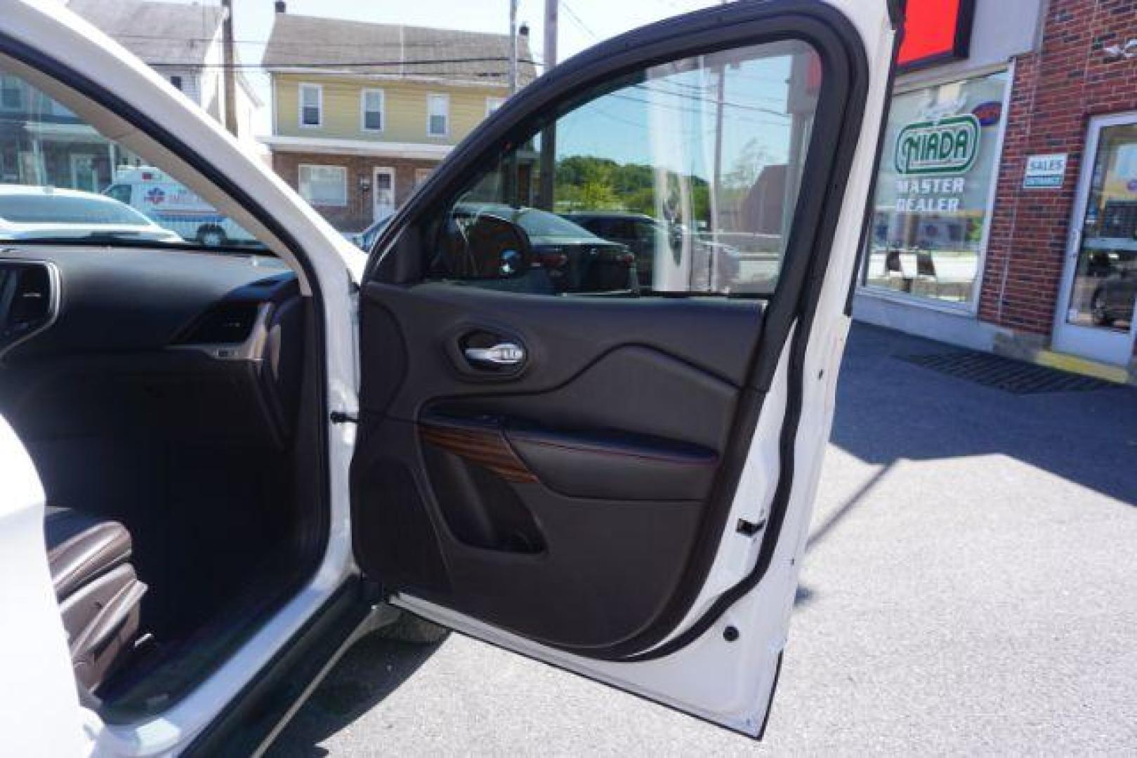 2015 Bright White Clearcoat Jeep Cherokee Trailhawk 4WD (1C4PJMBS2FW) with an 3.2L V6 DOHC 24V engine, 9-Speed Automatic transmission, located at 312 Centre Ave, Schuylkill Haven, PA, 17972, (570) 593-5278, 40.638130, -76.177383 - driver's seat memory, heated front seats, lane departure warning, leather seats, navigation, passive keyless entry, power drivers seat, power liftgate, power sunroof, rear parking sensors, towing pkg - Photo#50