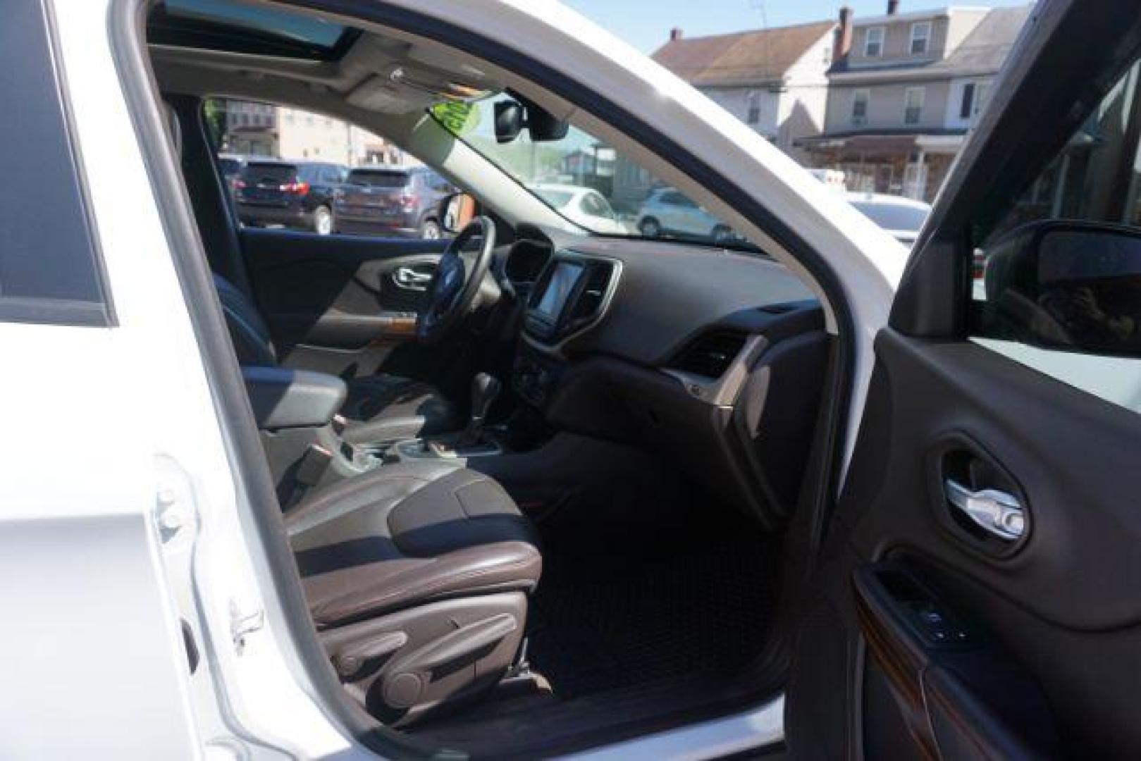 2015 Bright White Clearcoat Jeep Cherokee Trailhawk 4WD (1C4PJMBS2FW) with an 3.2L V6 DOHC 24V engine, 9-Speed Automatic transmission, located at 312 Centre Ave, Schuylkill Haven, PA, 17972, (570) 593-5278, 40.638130, -76.177383 - driver's seat memory, heated front seats, lane departure warning, leather seats, navigation, passive keyless entry, power drivers seat, power liftgate, power sunroof, rear parking sensors, towing pkg - Photo#52