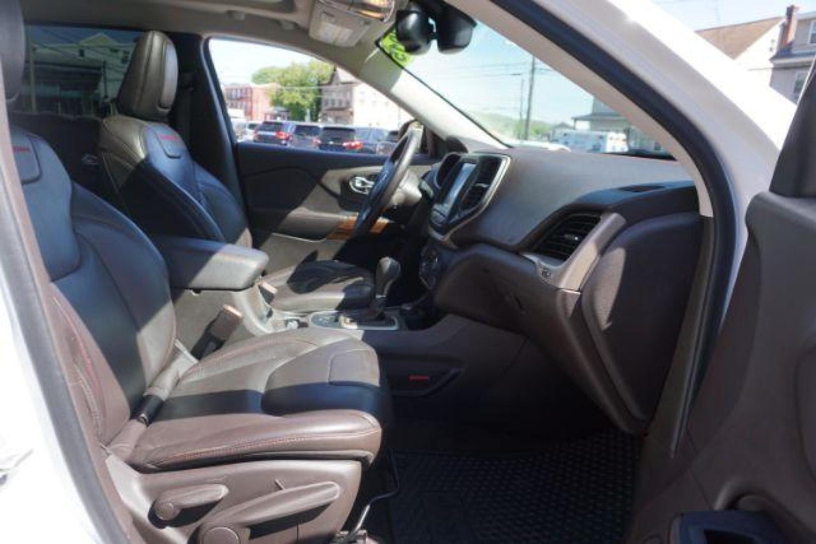 2015 Bright White Clearcoat Jeep Cherokee Trailhawk 4WD (1C4PJMBS2FW) with an 3.2L V6 DOHC 24V engine, 9-Speed Automatic transmission, located at 312 Centre Ave, Schuylkill Haven, PA, 17972, (570) 593-5278, 40.638130, -76.177383 - driver's seat memory, heated front seats, lane departure warning, leather seats, navigation, passive keyless entry, power drivers seat, power liftgate, power sunroof, rear parking sensors, towing pkg - Photo#53