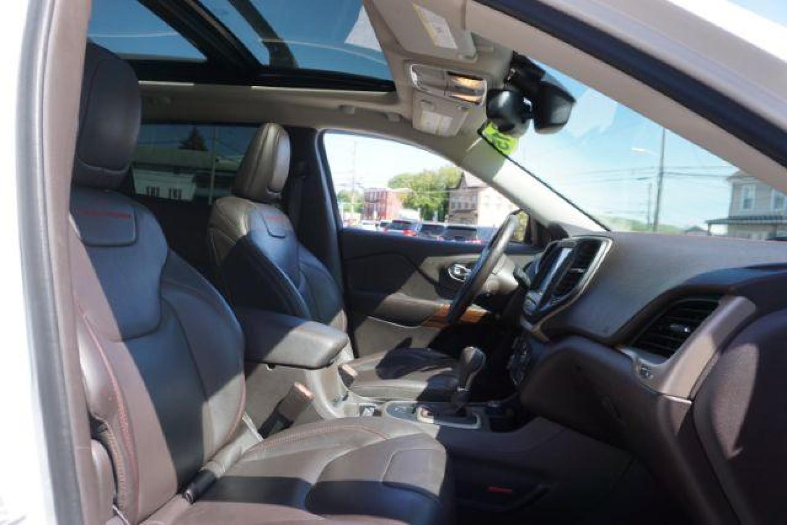 2015 Bright White Clearcoat Jeep Cherokee Trailhawk 4WD (1C4PJMBS2FW) with an 3.2L V6 DOHC 24V engine, 9-Speed Automatic transmission, located at 312 Centre Ave, Schuylkill Haven, PA, 17972, (570) 593-5278, 40.638130, -76.177383 - driver's seat memory, heated front seats, lane departure warning, leather seats, navigation, passive keyless entry, power drivers seat, power liftgate, power sunroof, rear parking sensors, towing pkg - Photo#54