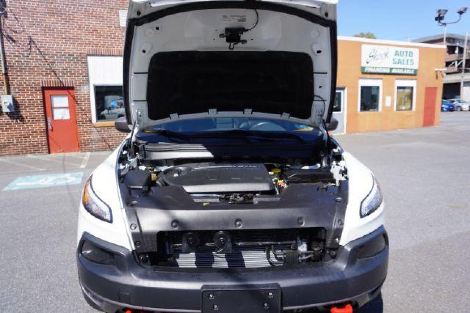 2015 Bright White Clearcoat Jeep Cherokee Trailhawk 4WD (1C4PJMBS2FW) with an 3.2L V6 DOHC 24V engine, 9-Speed Automatic transmission, located at 312 Centre Ave, Schuylkill Haven, PA, 17972, (570) 593-5278, 40.638130, -76.177383 - driver's seat memory, heated front seats, lane departure warning, leather seats, navigation, passive keyless entry, power drivers seat, power liftgate, power sunroof, rear parking sensors, towing pkg - Photo#56