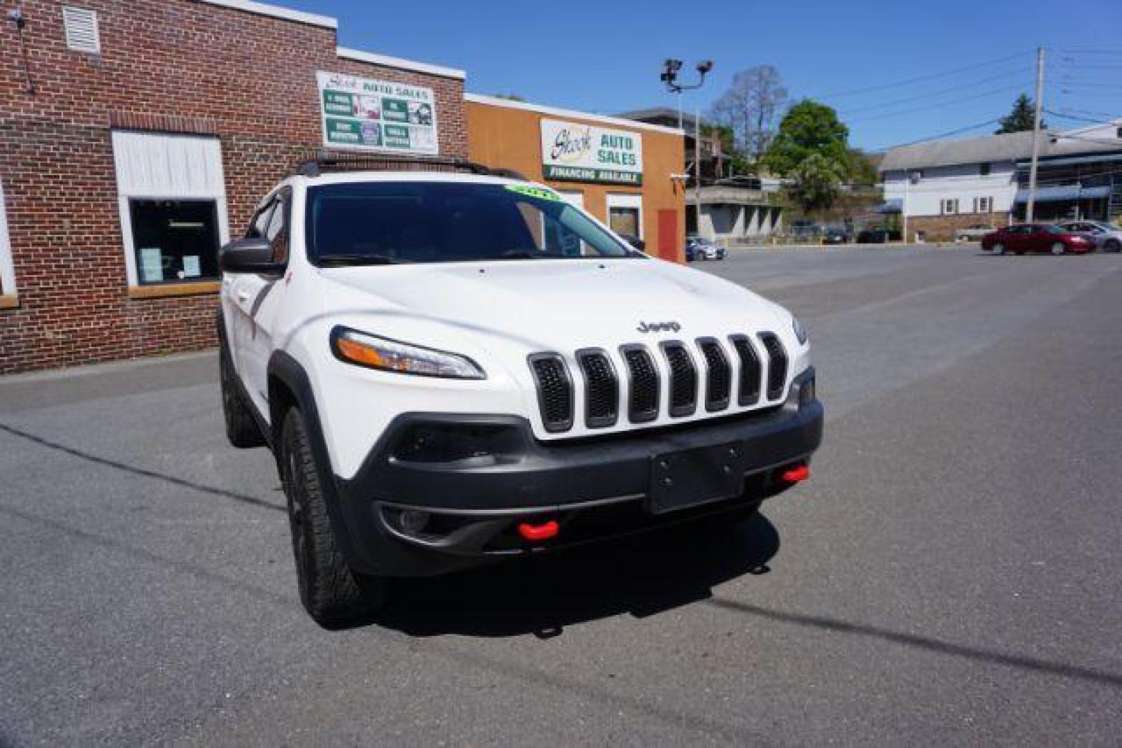 2015 Bright White Clearcoat Jeep Cherokee Trailhawk 4WD (1C4PJMBS2FW) with an 3.2L V6 DOHC 24V engine, 9-Speed Automatic transmission, located at 312 Centre Ave, Schuylkill Haven, PA, 17972, (570) 593-5278, 40.638130, -76.177383 - driver's seat memory, heated front seats, lane departure warning, leather seats, navigation, passive keyless entry, power drivers seat, power liftgate, power sunroof, rear parking sensors, towing pkg - Photo#6