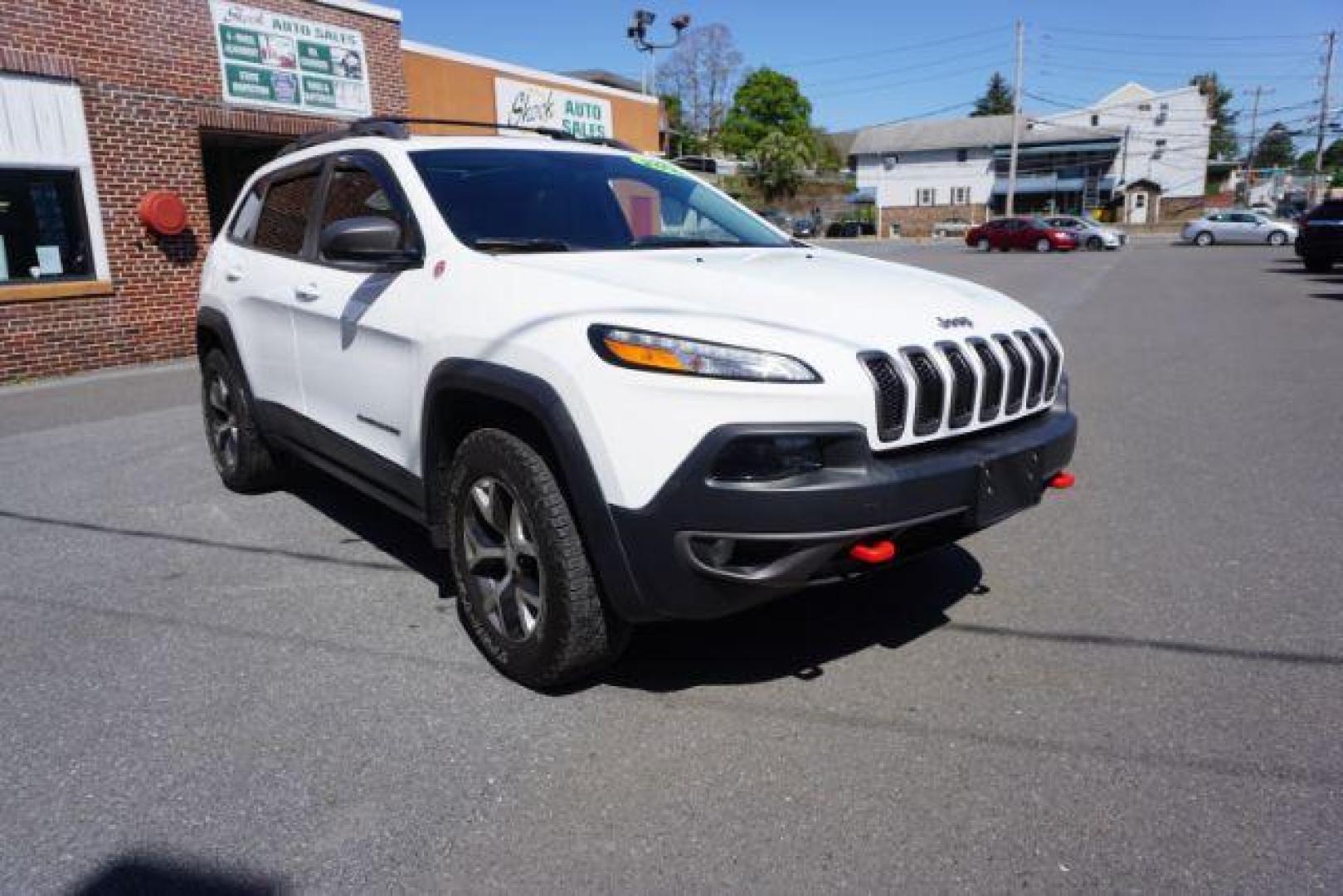 2015 Bright White Clearcoat Jeep Cherokee Trailhawk 4WD (1C4PJMBS2FW) with an 3.2L V6 DOHC 24V engine, 9-Speed Automatic transmission, located at 312 Centre Ave, Schuylkill Haven, PA, 17972, (570) 593-5278, 40.638130, -76.177383 - driver's seat memory, heated front seats, lane departure warning, leather seats, navigation, passive keyless entry, power drivers seat, power liftgate, power sunroof, rear parking sensors, towing pkg - Photo#7