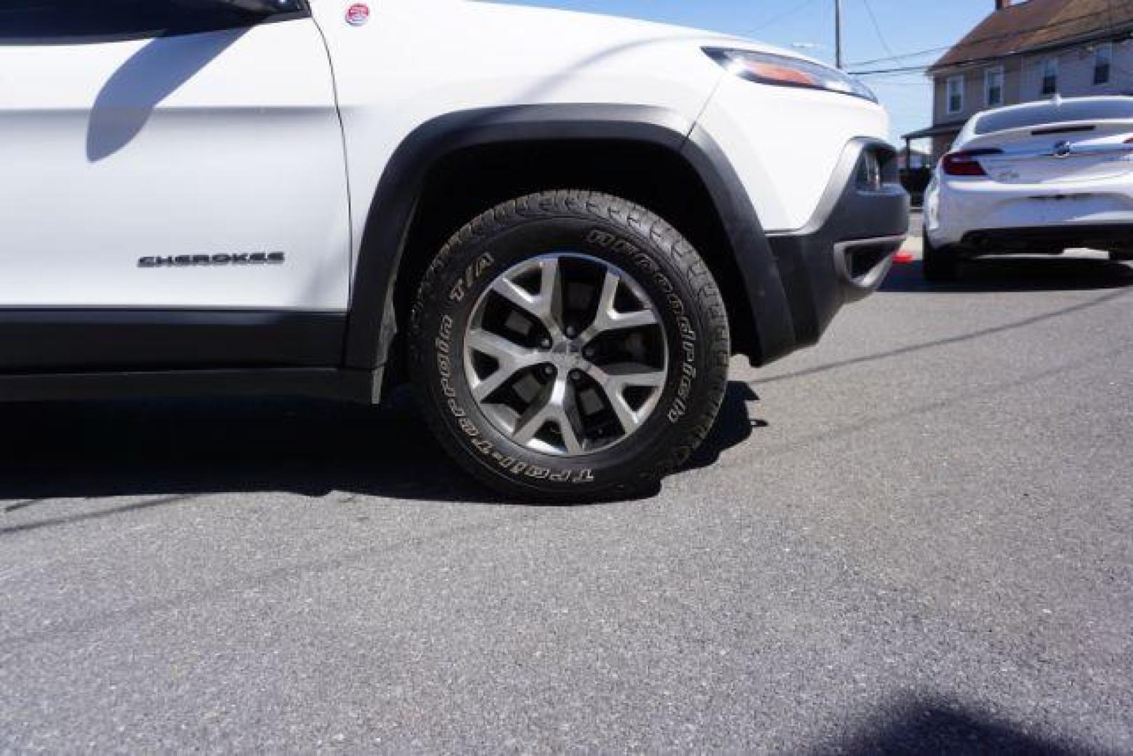 2015 Bright White Clearcoat Jeep Cherokee Trailhawk 4WD (1C4PJMBS2FW) with an 3.2L V6 DOHC 24V engine, 9-Speed Automatic transmission, located at 312 Centre Ave, Schuylkill Haven, PA, 17972, (570) 593-5278, 40.638130, -76.177383 - driver's seat memory, heated front seats, lane departure warning, leather seats, navigation, passive keyless entry, power drivers seat, power liftgate, power sunroof, rear parking sensors, towing pkg - Photo#8