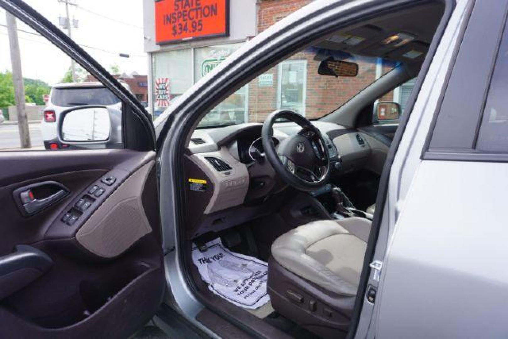 2014 Graphite Gray /Taupe Hyundai Tucson GLS AWD (KM8JUCAG3EU) with an 2.4L L4 DOHC 16V engine, 6-Speed Automatic transmission, located at 312 Centre Ave, Schuylkill Haven, PA, 17972, (570) 593-5278, 40.638130, -76.177383 - Photo#21