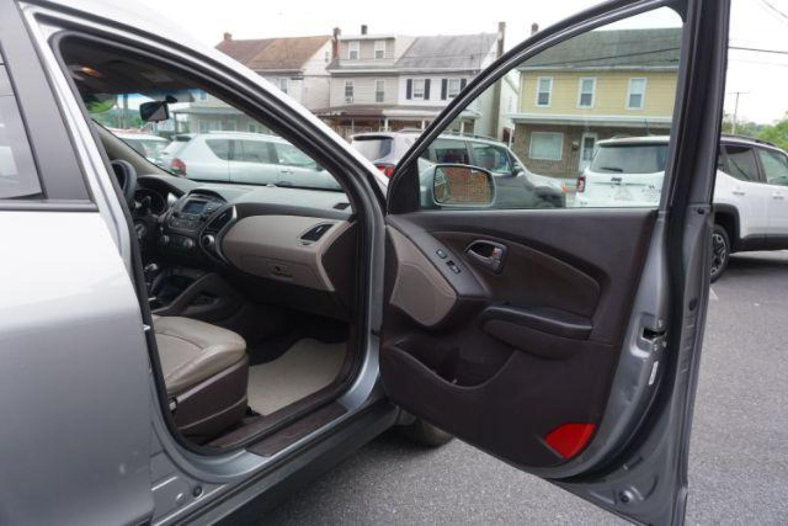 2014 Graphite Gray /Taupe Hyundai Tucson GLS AWD (KM8JUCAG3EU) with an 2.4L L4 DOHC 16V engine, 6-Speed Automatic transmission, located at 312 Centre Ave, Schuylkill Haven, PA, 17972, (570) 593-5278, 40.638130, -76.177383 - Photo#48