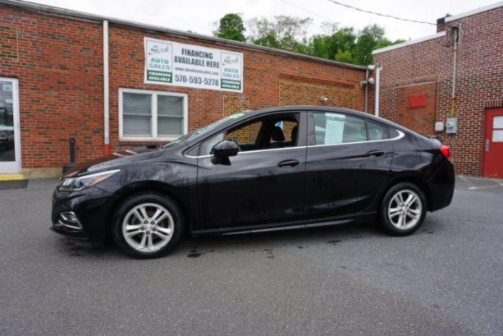 2016 Mosaic Black Metallic Chevrolet Cruze LT Auto (1G1BE5SM3G7) with an 1.4L L4 DOHC 16V TURBO engine, 6-Speed Automatic transmission, located at 312 Centre Ave, Schuylkill Haven, PA, 17972, (570) 593-5278, 40.638130, -76.177383 - aluminum/alloy wheels, fog lights - Photo#0