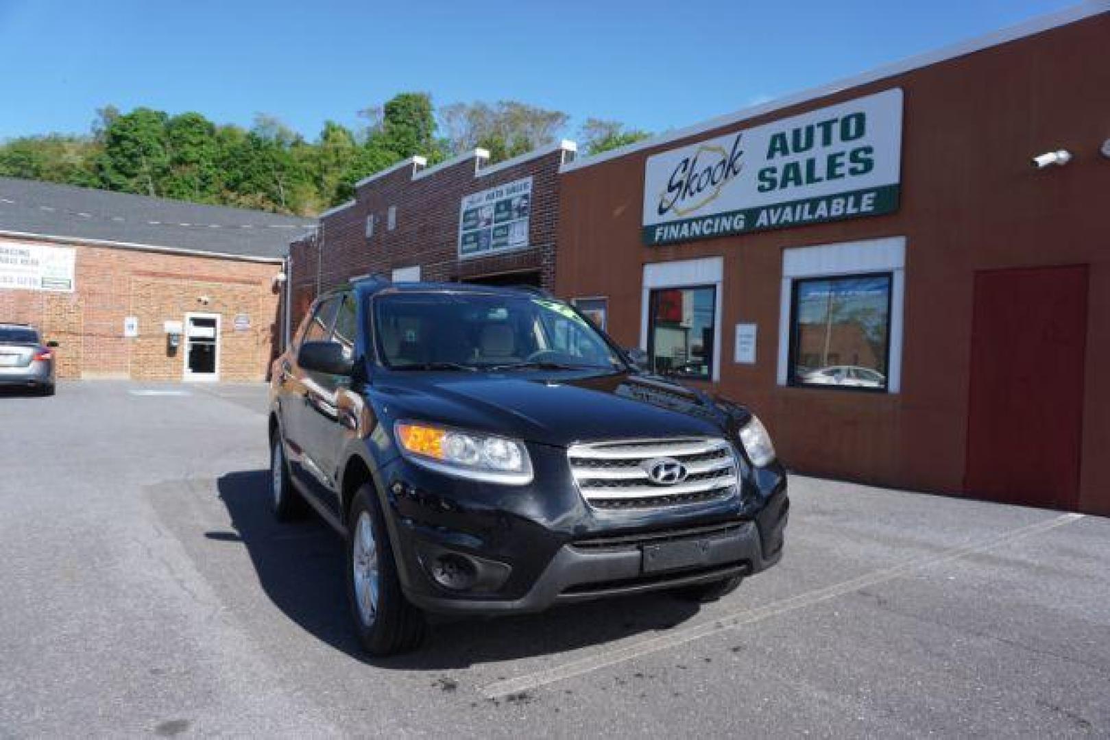 2012 Twilight Black Hyundai Santa Fe SPORT UTILITY 4-DR (5XYZGDAB1CG) with an 2.4L L4 DOHC 16V engine, 6-Speed Automatic transmission, located at 312 Centre Ave, Schuylkill Haven, PA, 17972, (570) 593-5278, 40.638130, -76.177383 - Photo#0