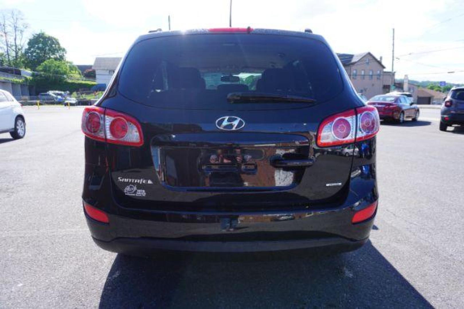 2012 Twilight Black Hyundai Santa Fe SPORT UTILITY 4-DR (5XYZGDAB1CG) with an 2.4L L4 DOHC 16V engine, 6-Speed Automatic transmission, located at 312 Centre Ave, Schuylkill Haven, PA, 17972, (570) 593-5278, 40.638130, -76.177383 - Photo#11