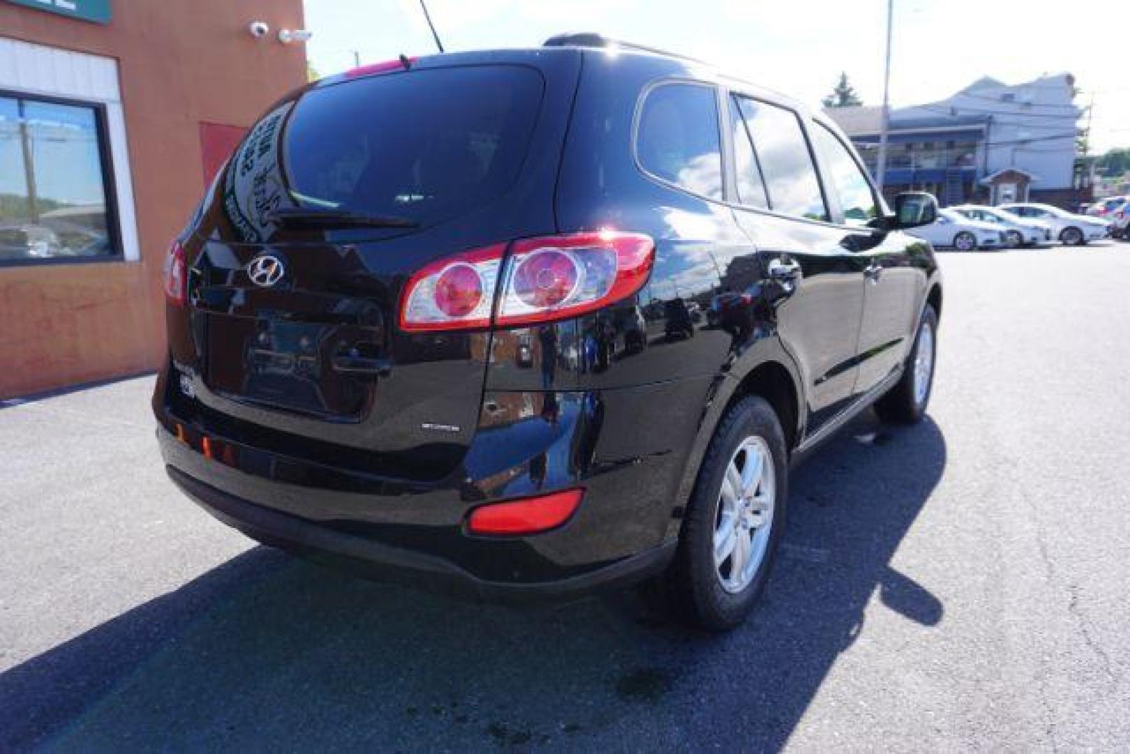 2012 Twilight Black Hyundai Santa Fe SPORT UTILITY 4-DR (5XYZGDAB1CG) with an 2.4L L4 DOHC 16V engine, 6-Speed Automatic transmission, located at 312 Centre Ave, Schuylkill Haven, PA, 17972, (570) 593-5278, 40.638130, -76.177383 - Photo#12